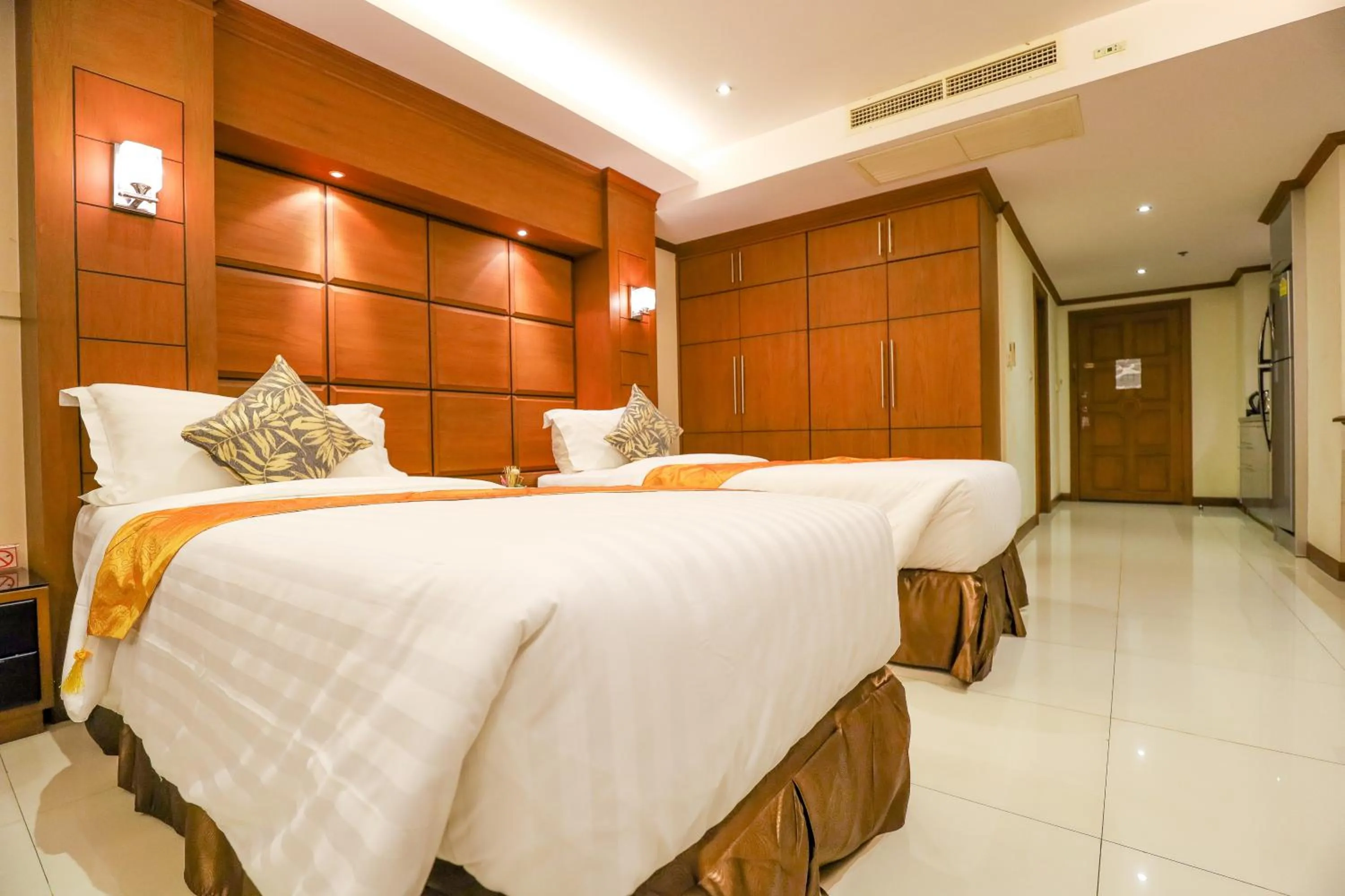 Bed in Tara Court Hotel