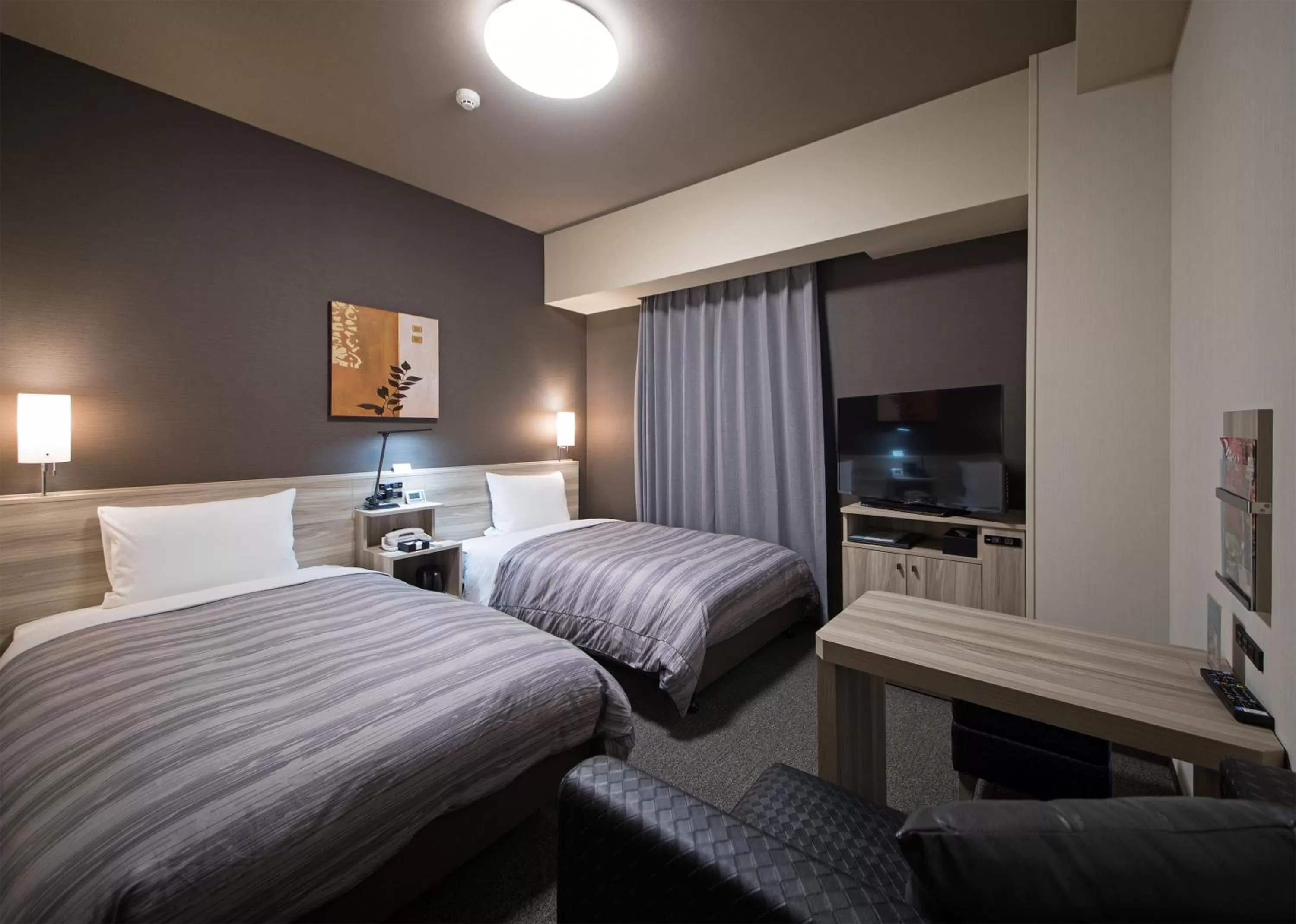 Bed in Hotel Route-Inn Hamada Ekimae