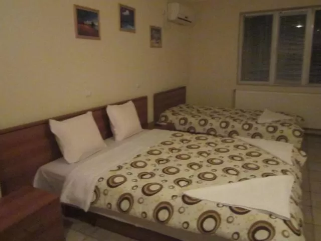 Bed in Versai Hotel