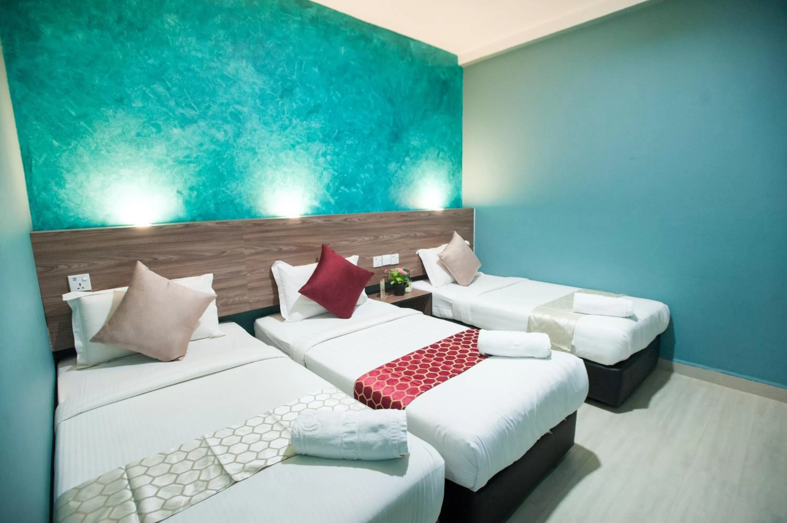 Bed in DJ Citi Point Hotel