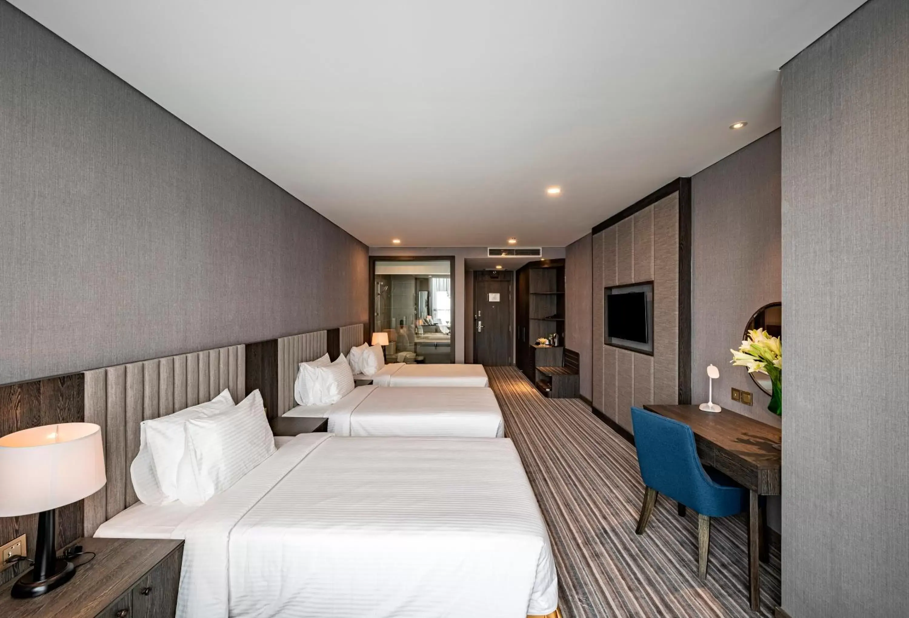 Deluxe Triple Room in Muong Thanh Luxury Saigon Hotel Deluxe Triple Room in Muong Thanh Luxury Saigon Hotel