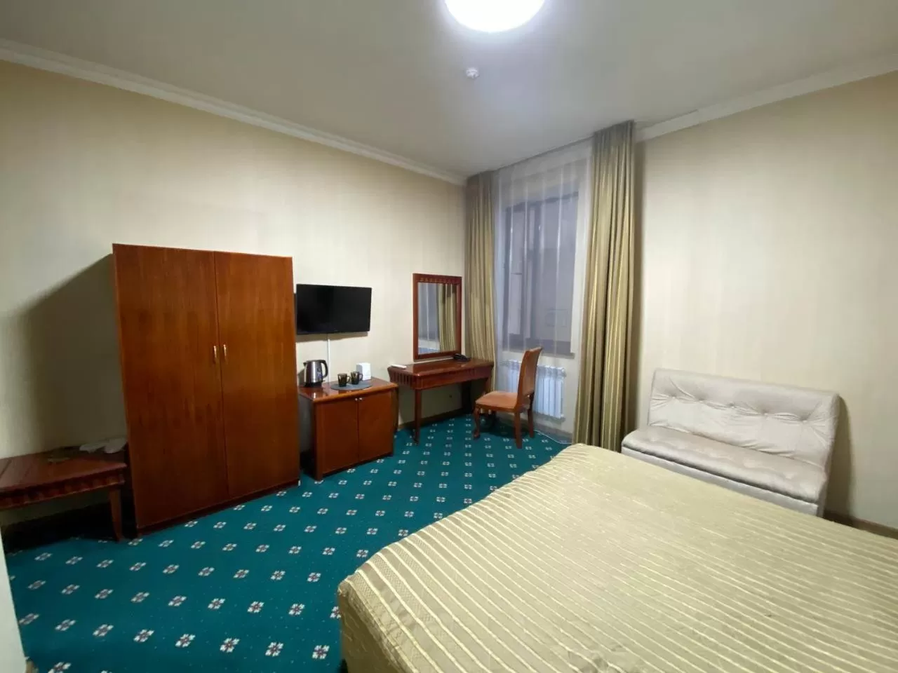 Bed in Deluxe SPA-Hotel