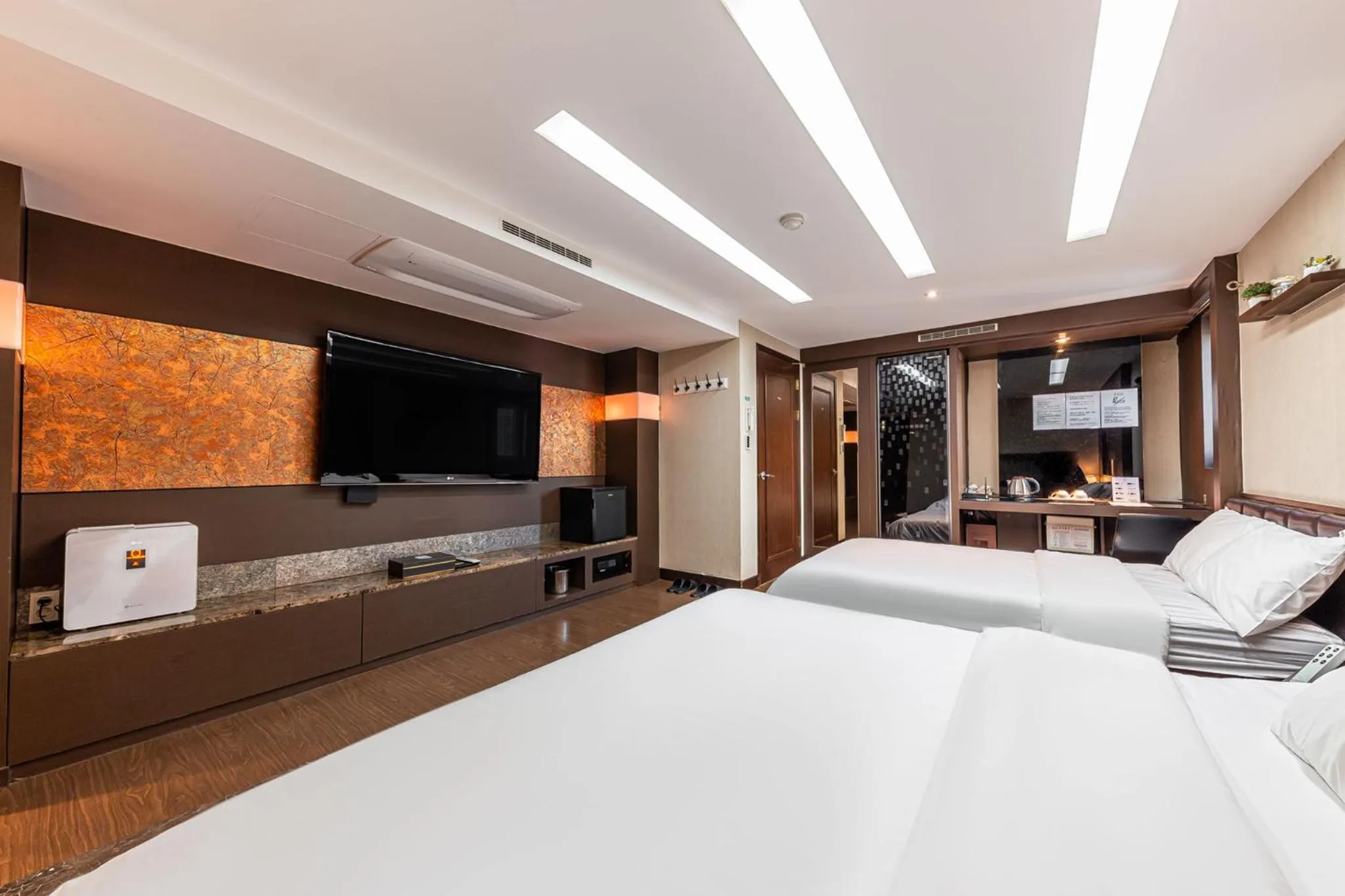 Bed in Friendly DH Naissance Hotel by Mindrum Group