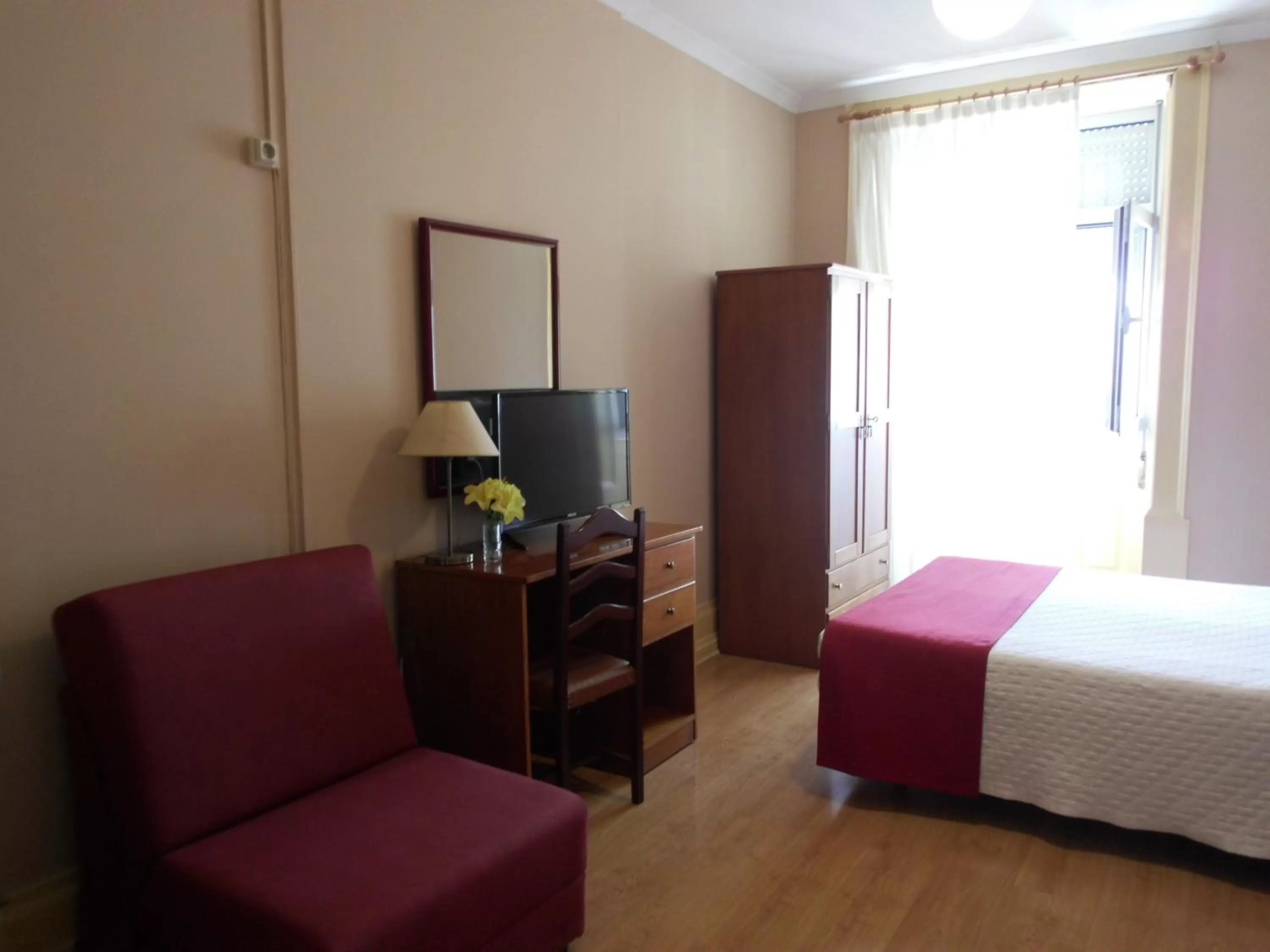 Bed in Hotel Larbelo