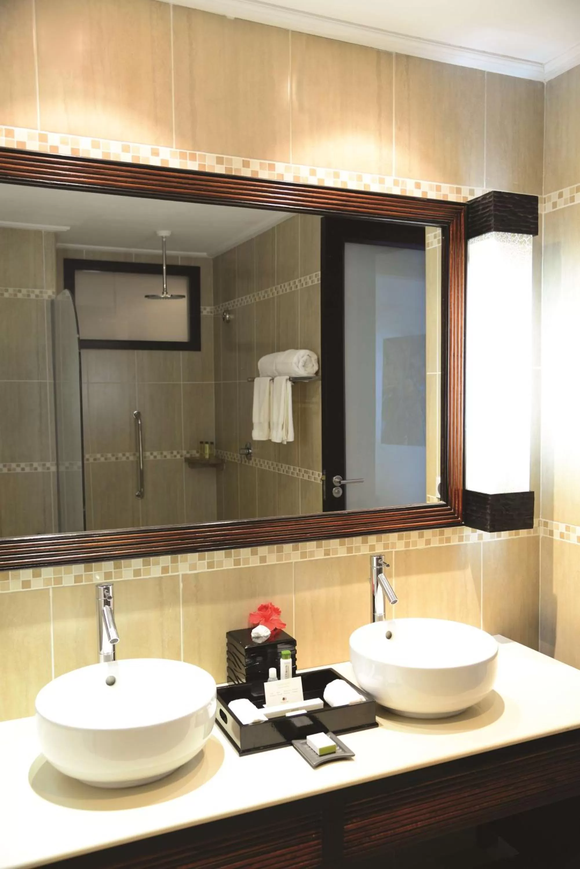 Shower in DoubleTree by Hilton Seychelles Allamanda Resort & Spa