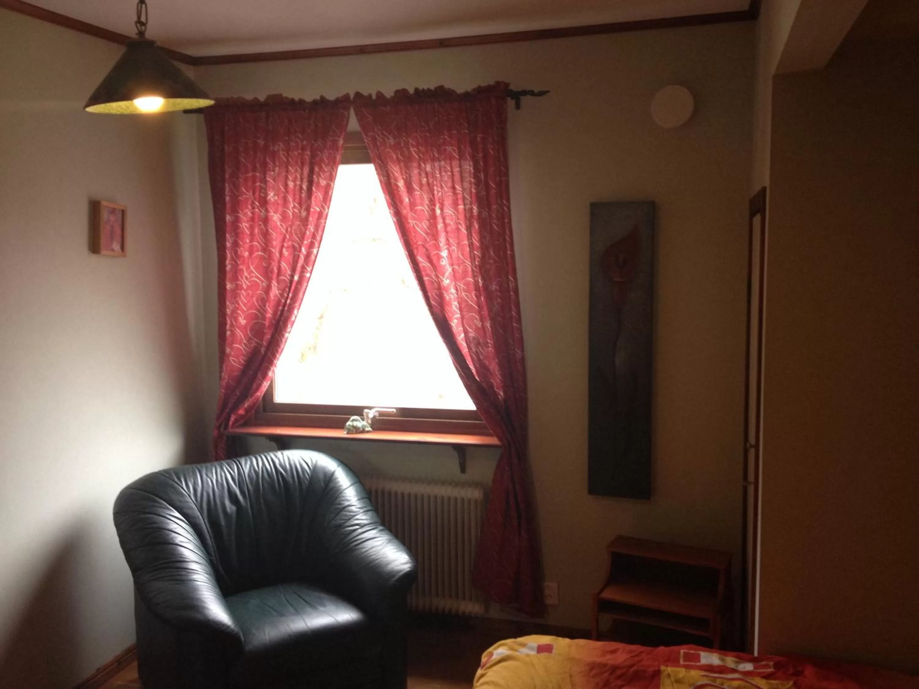 Bed, Seating Area in Stop at The Cross