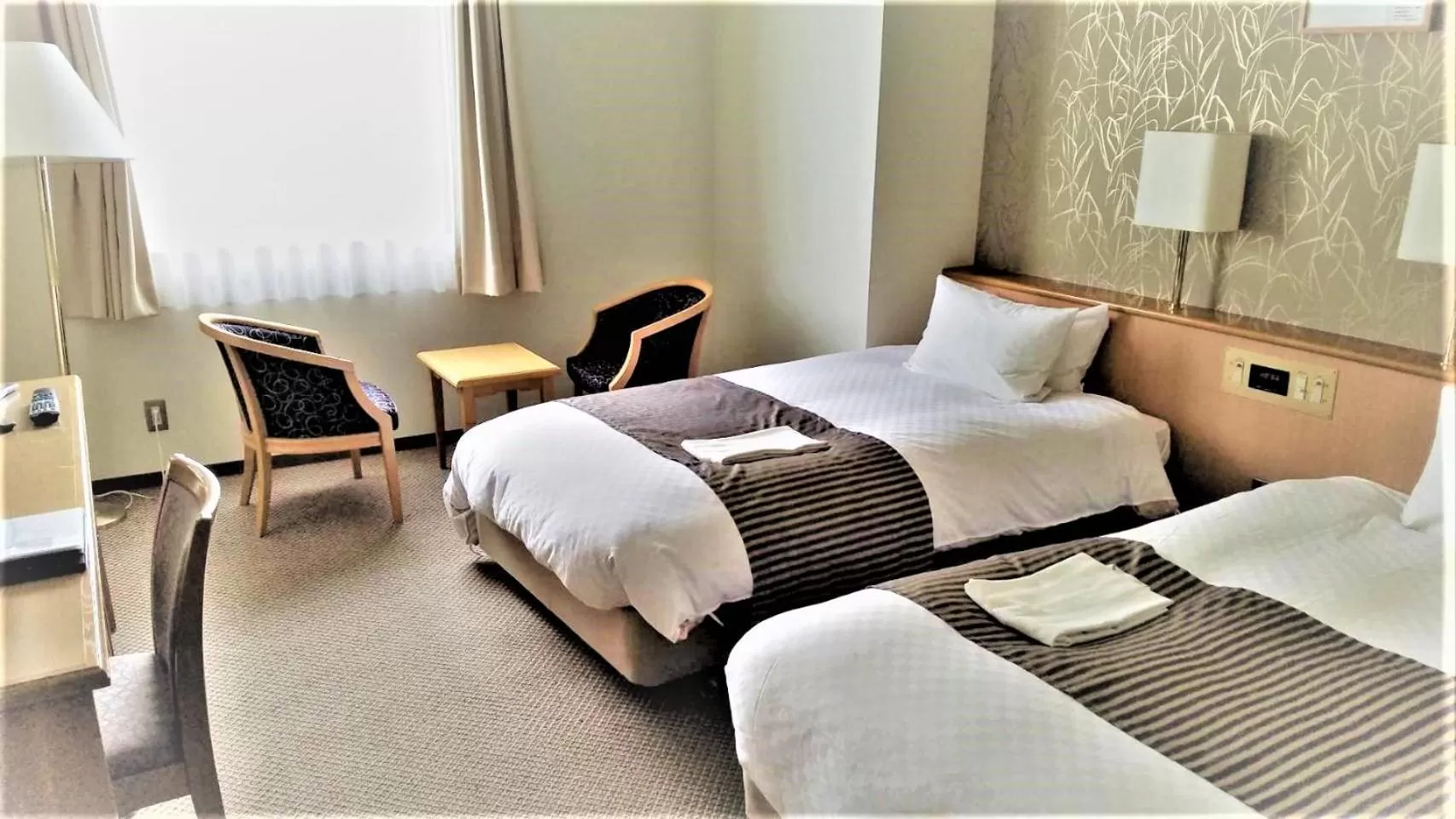 Bed in Ishinomaki Grand Hotel