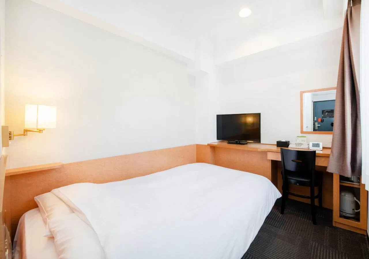 Bed in TKP Sunlife Hotel