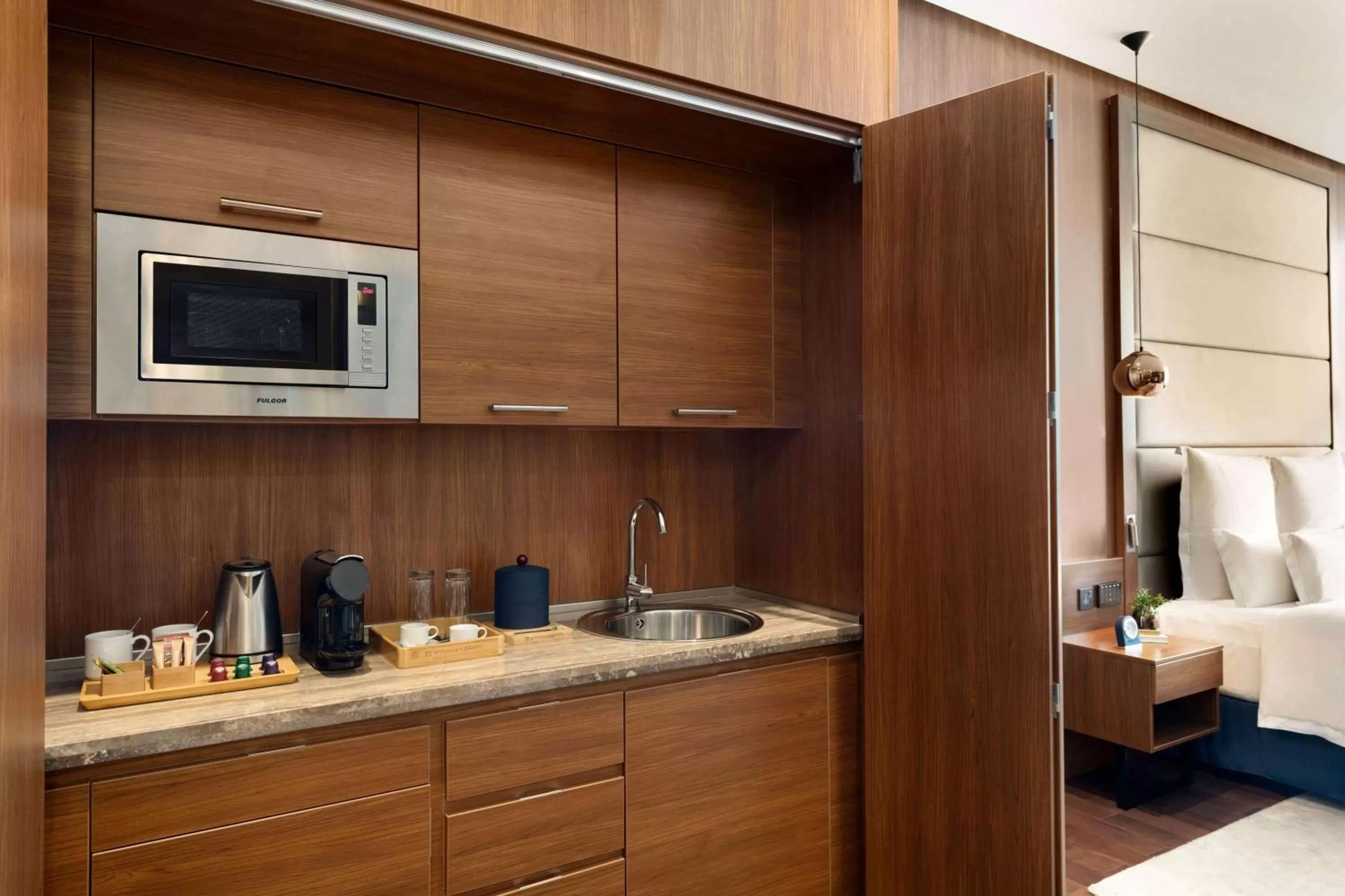 Bed in Wyndham Grand Manama