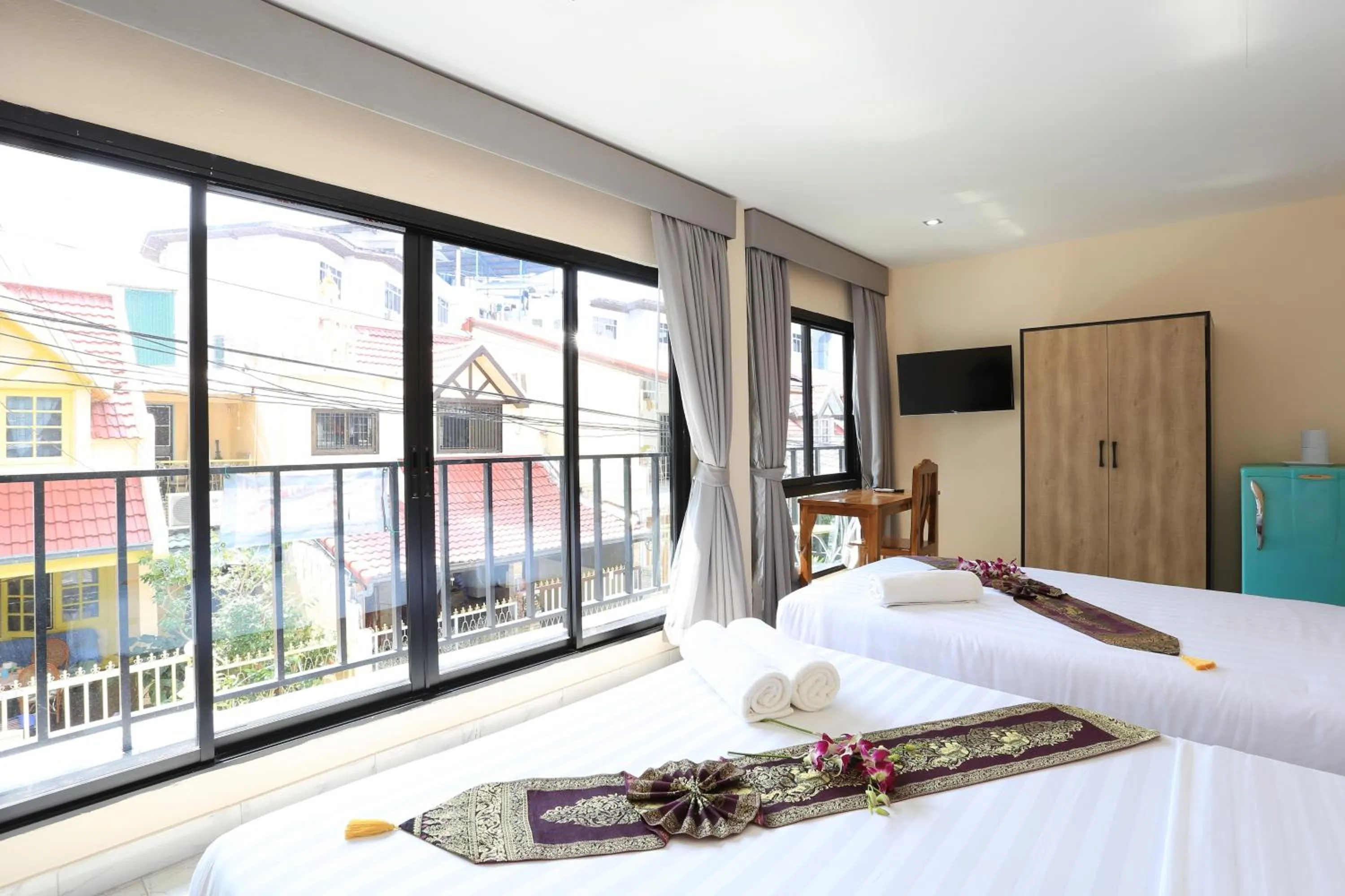 Photo of the whole room, Bed in The Siam Guest House - SHA Extra Plus