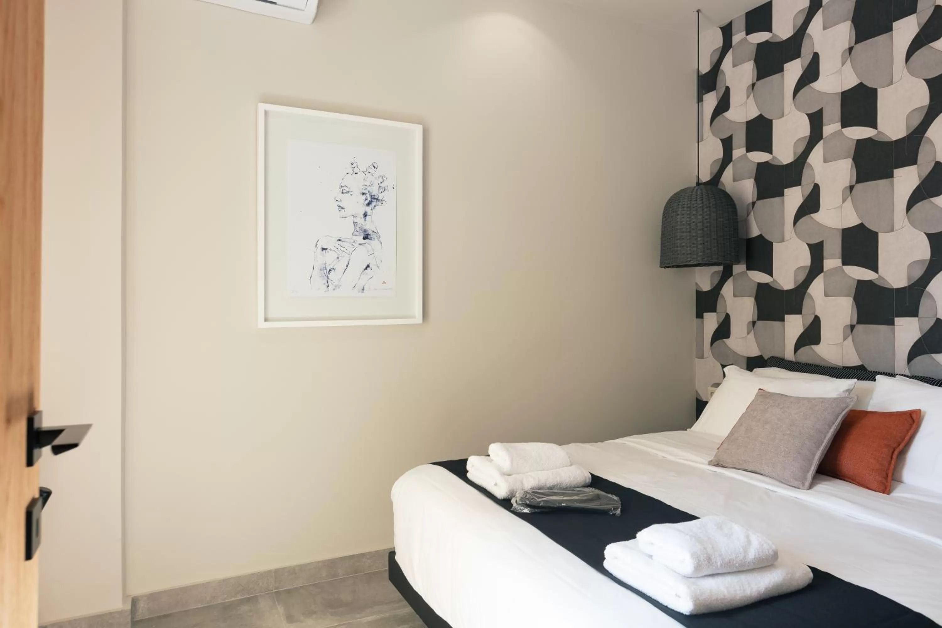 Bed in Chapter 02 Gallery Suites