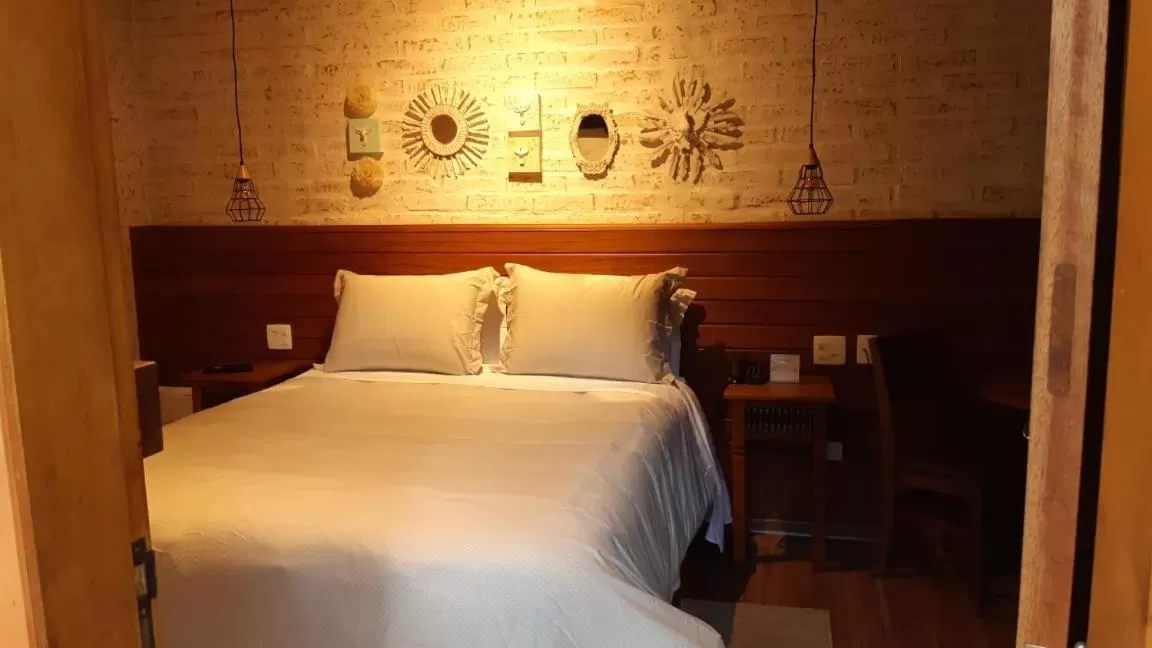 Bed in Pousada Toca Da Coruja