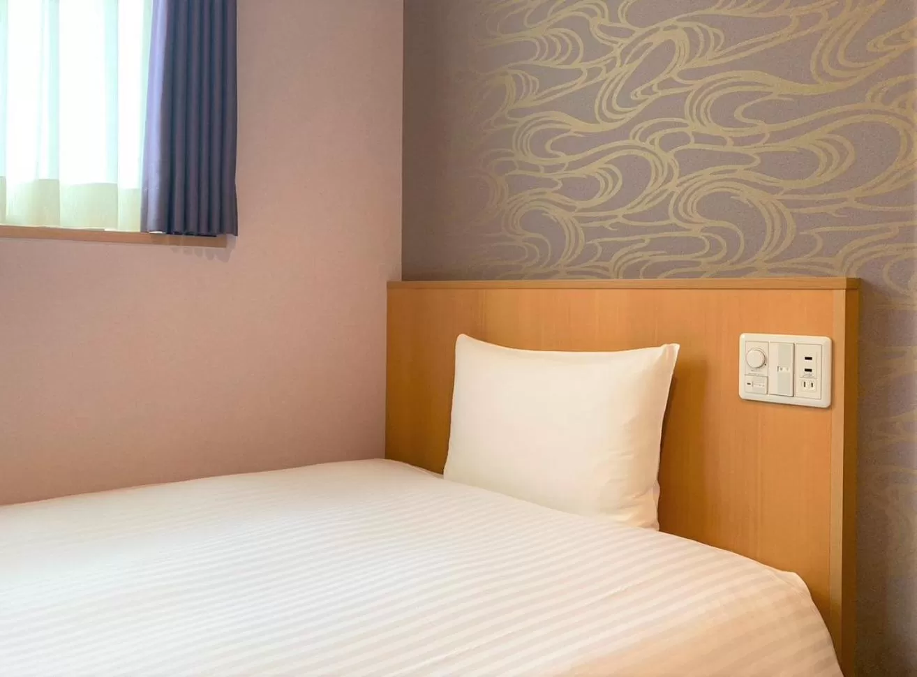 Bed in SAKURA SKY HOTEL KASHIWA(桜スカイホテル柏)