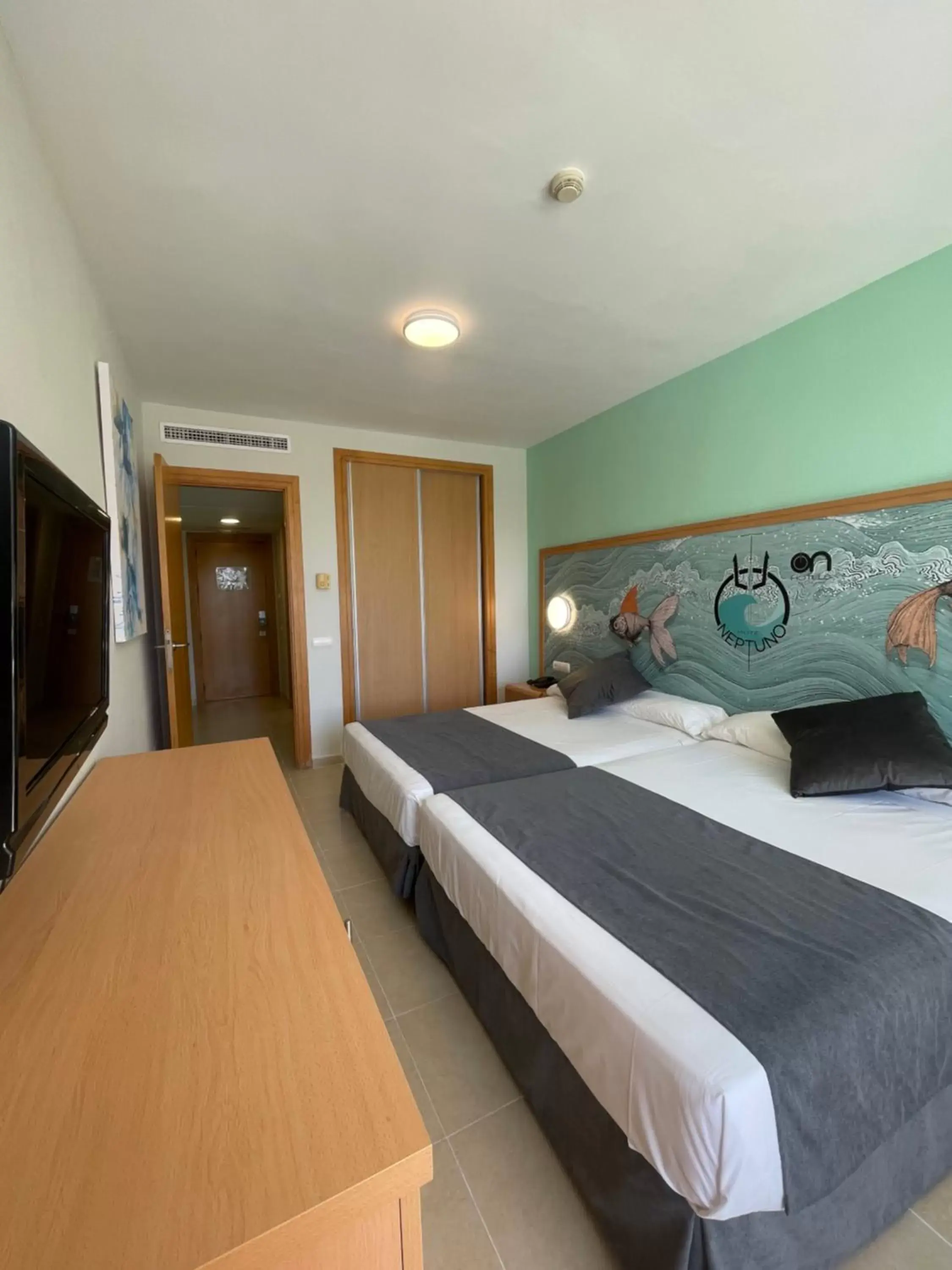 Twin Room (2 Adults + 2 Children) in Hotel Neptuno by ON GROUP Twin Room (2 Adults + 2 Children) in Hotel Neptuno by ON GROUP