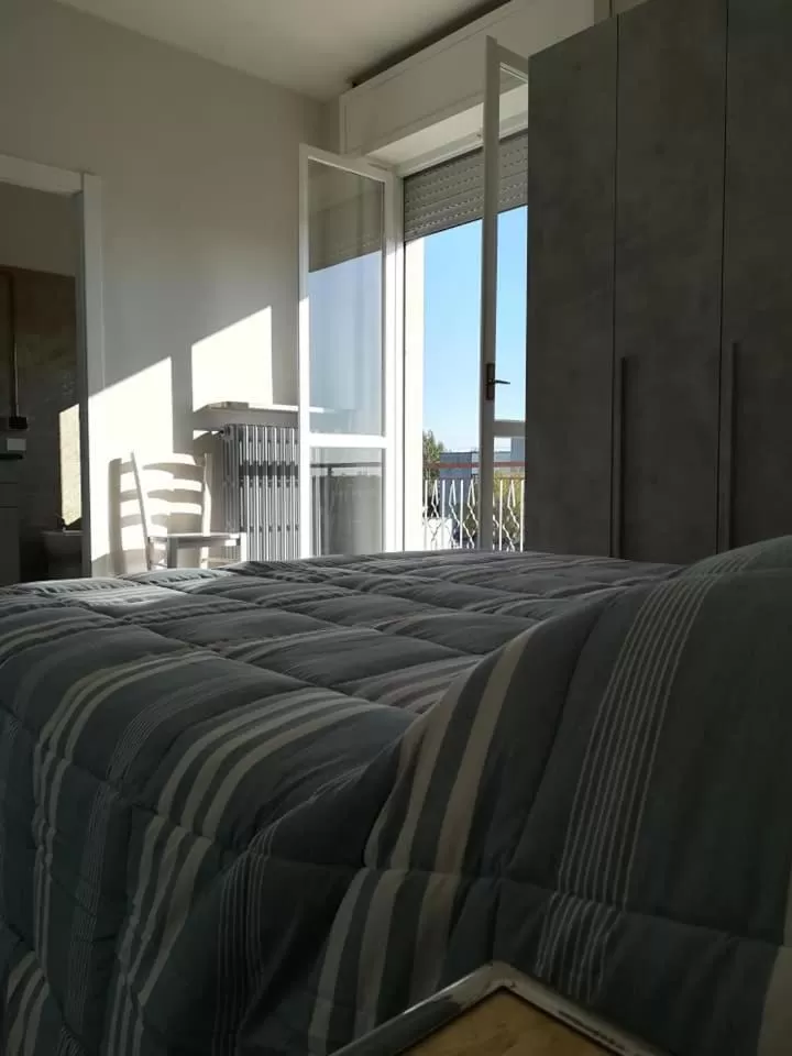 Photo of the whole room, Bed in LE MURA Foresteria