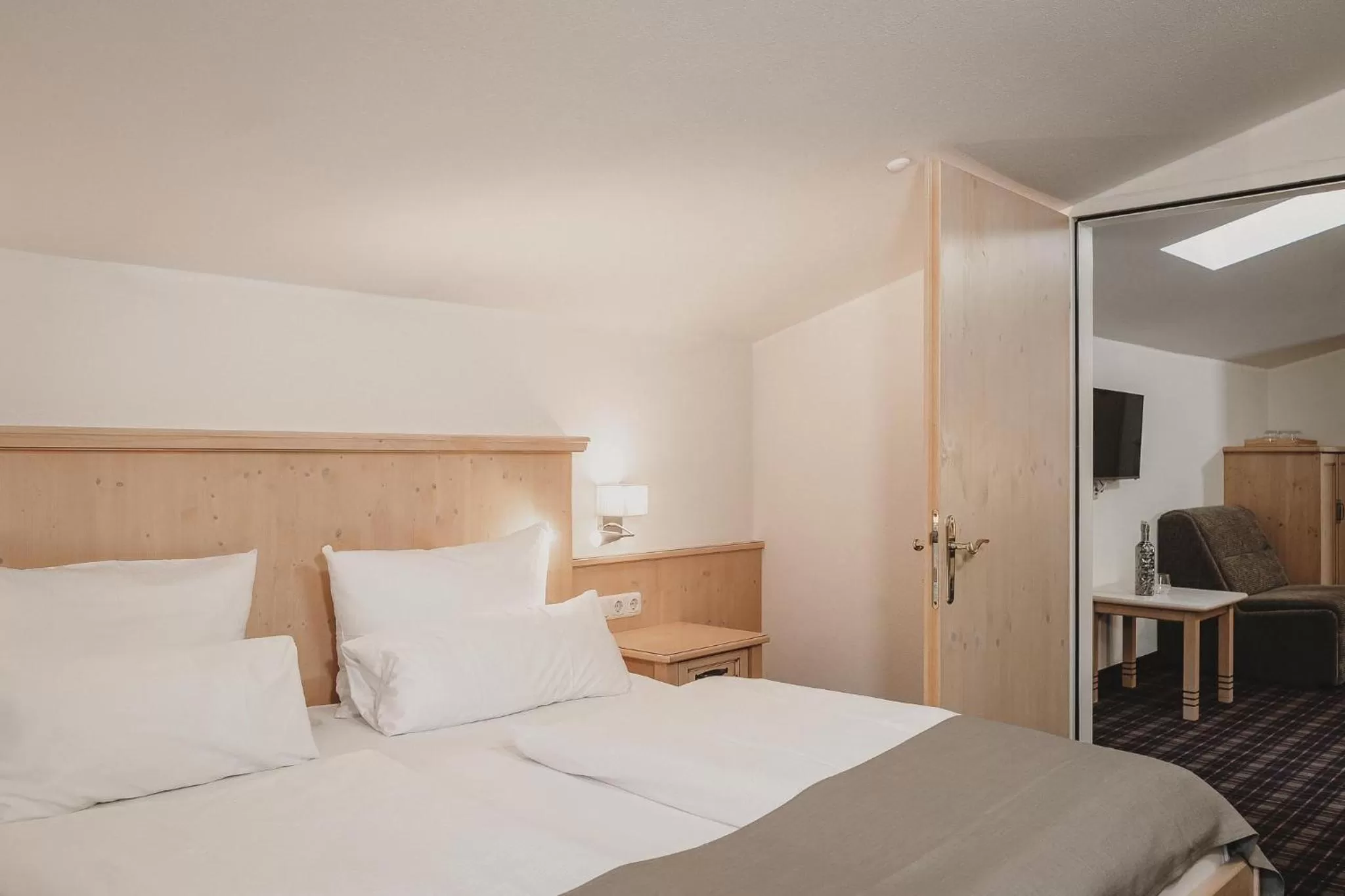 Photo of the whole room, Bed in Hotel & Appartements Tiroler Buam