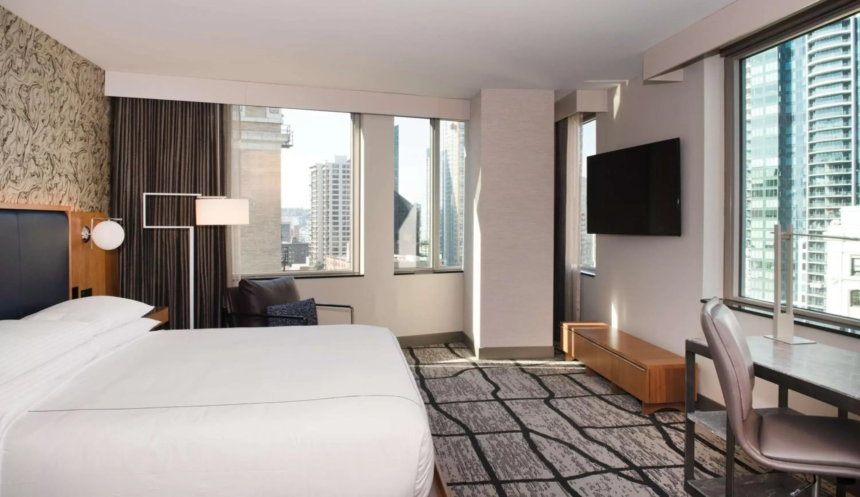 Corner King Room with City View - Mobility Accessible with Roll-In Shower in The Charter Hotel Seattle, Curio Collection By Hilton Corner King Room with City View - Mobility Accessible with Roll-In Shower in The Charter Hotel Seattle, Curio Collection By Hilton