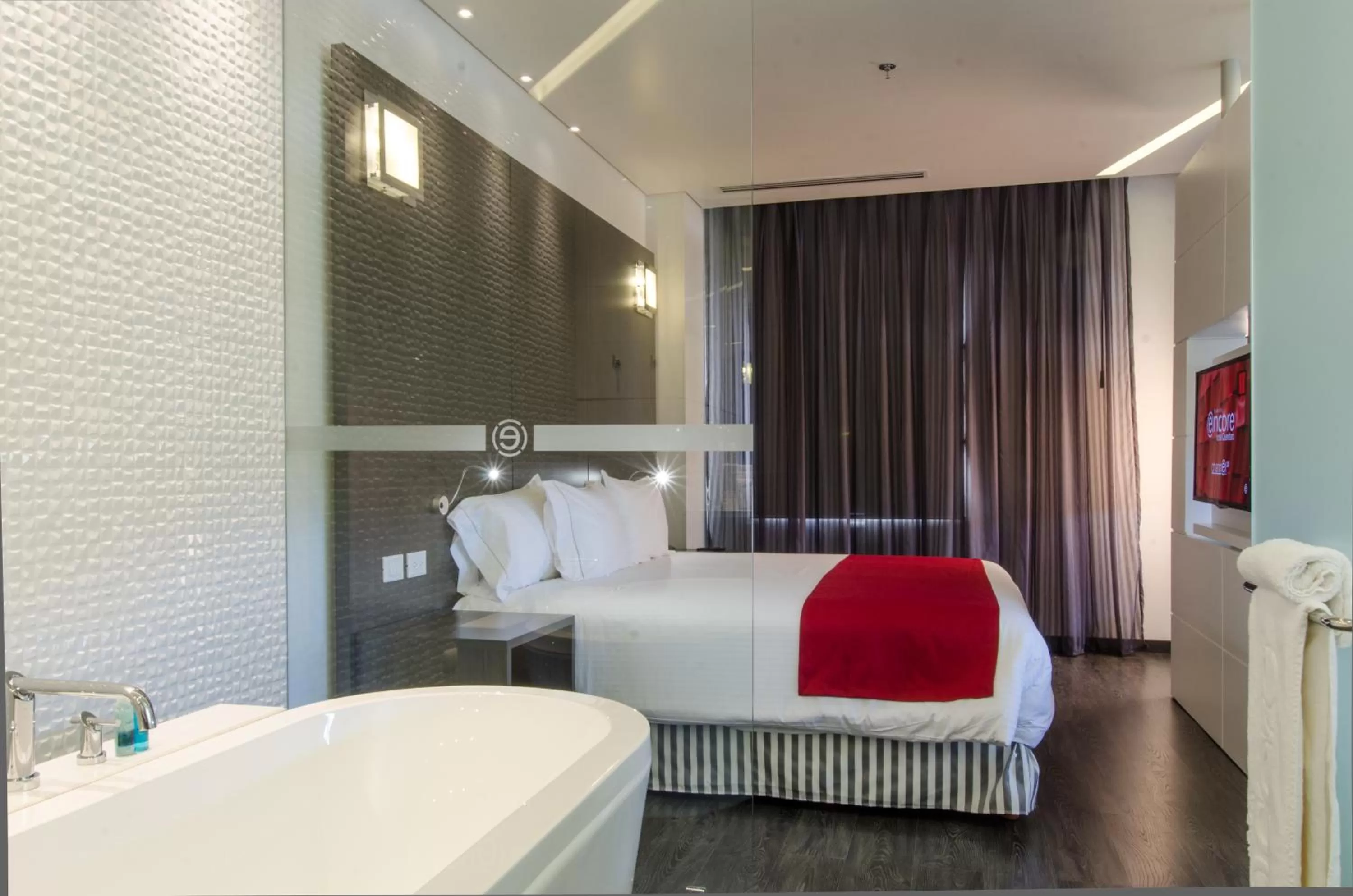 Bed in Ramada Encore by Wyndham San Luis Potosi