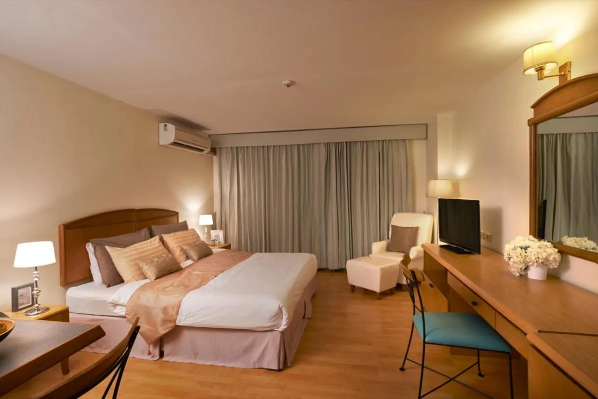 Photo of the whole room, Bed in Ravipha Residences