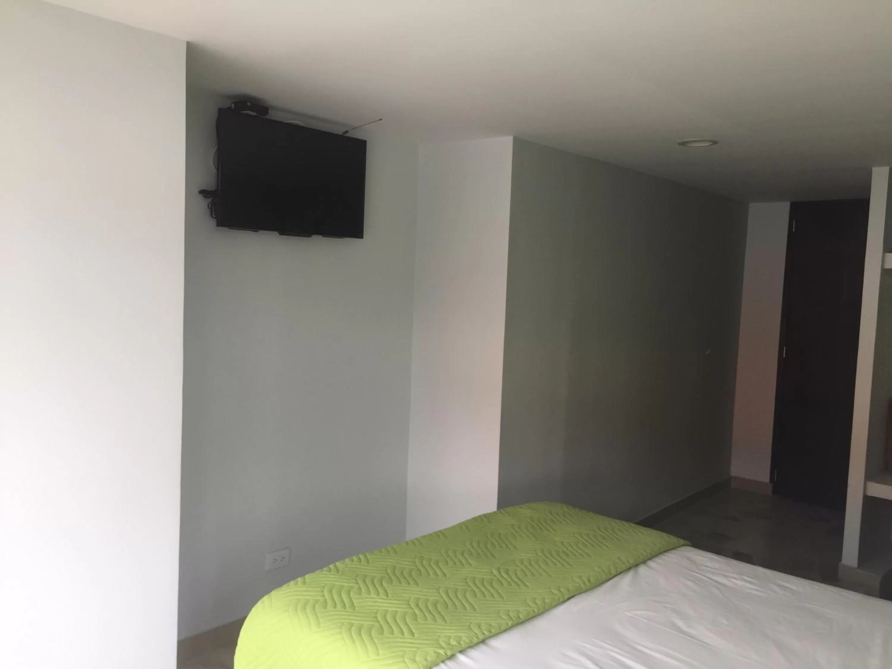 Bed in Hotel Garden City Boutique