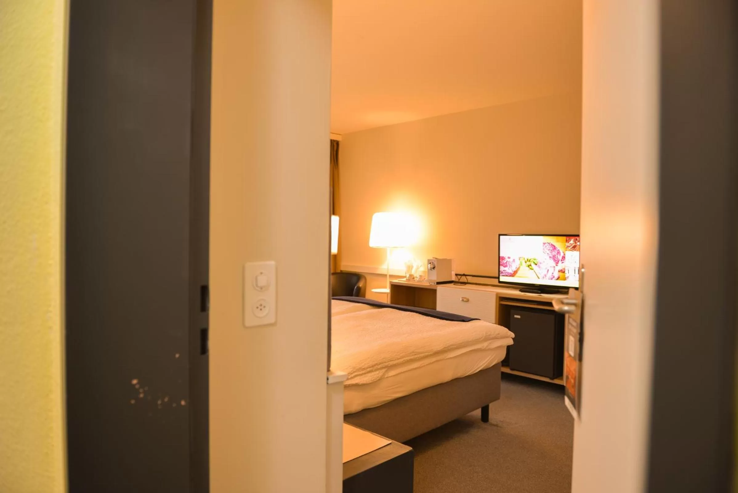 Family, Bed in Seehotel Riviera at Lake Lucerne