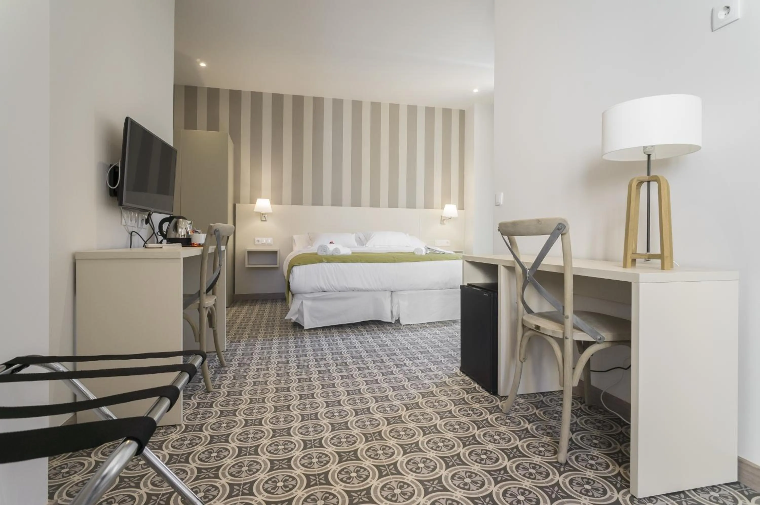 Bed in Hotel San Lorenzo Boutique Plaza