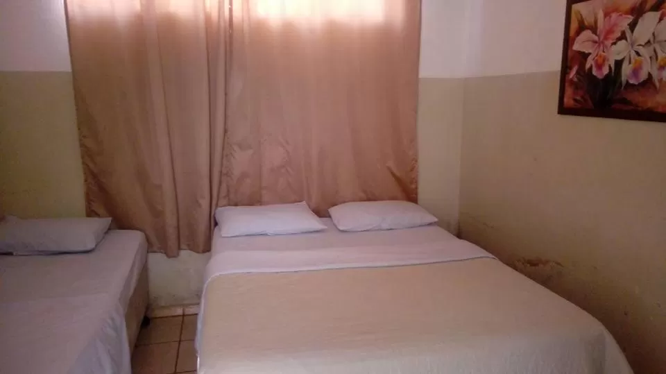 Property building, Bed in Hotel Cadore