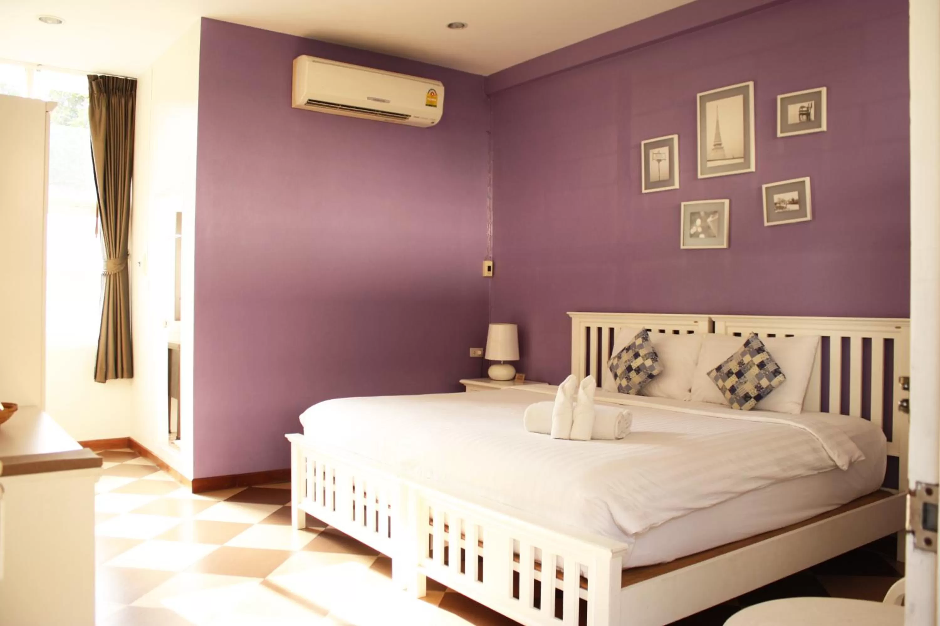 Bed in Feung Nakorn Balcony Rooms and Cafe