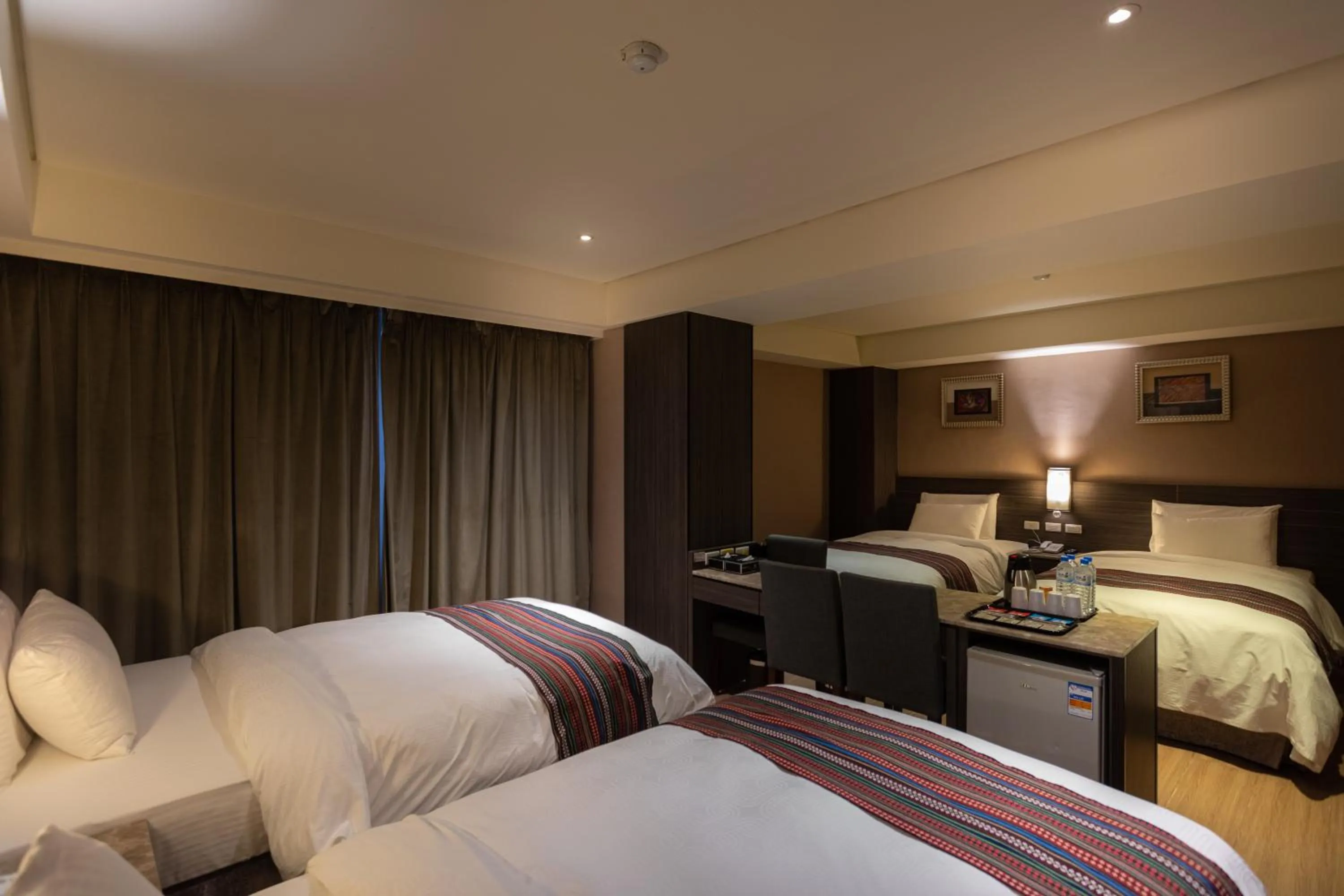 Bed in Royal Guest Hotel