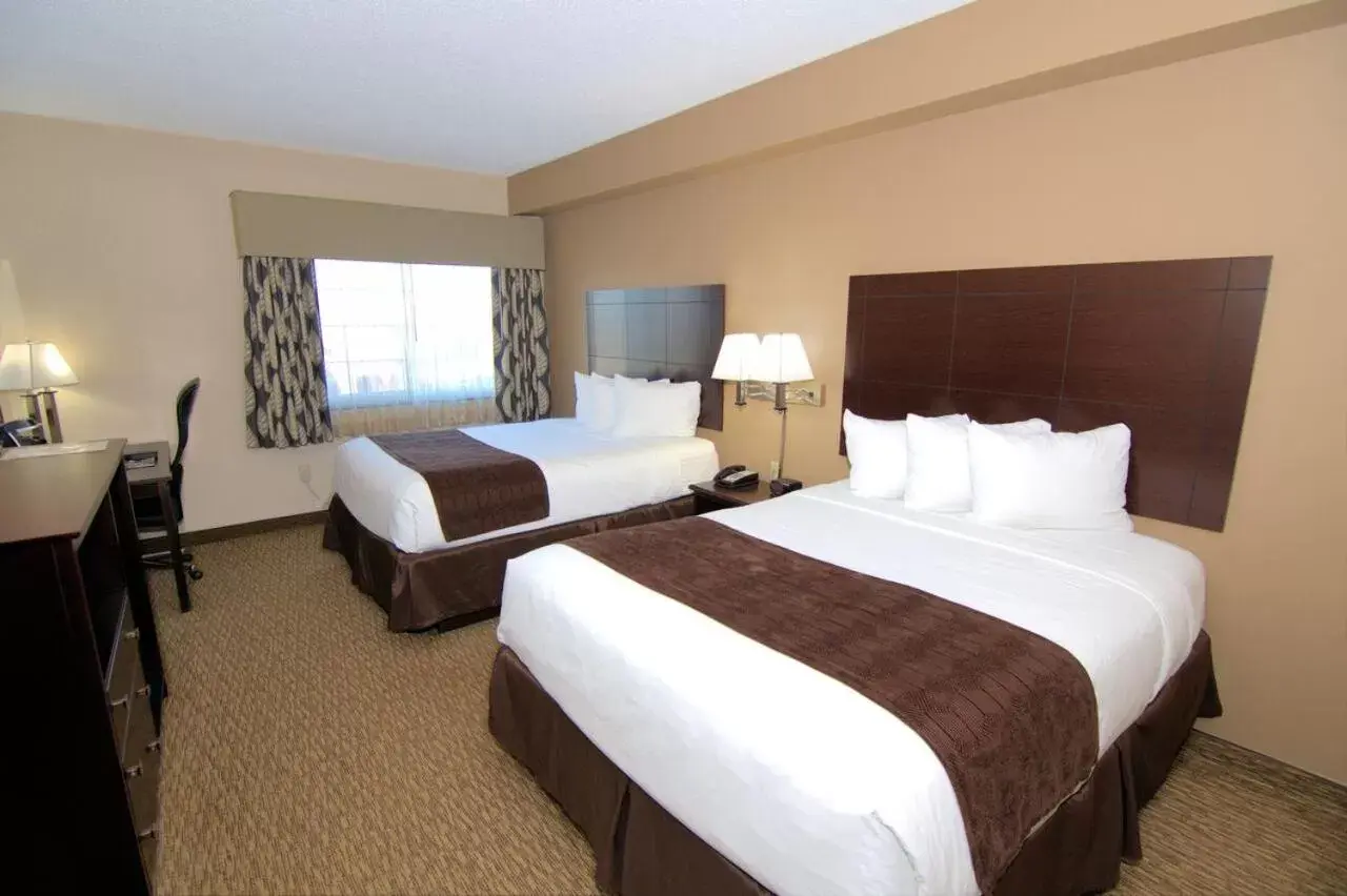 Queen Room with Two Queen Beds in Rock Island Inn & Suites Queen Room with Two Queen Beds in Rock Island Inn & Suites