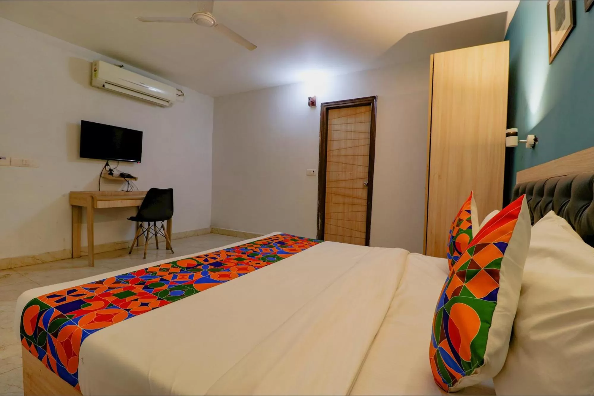 Bed in FabHotel Happy Inn