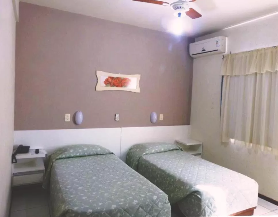 Bed in Hotel Cambirela