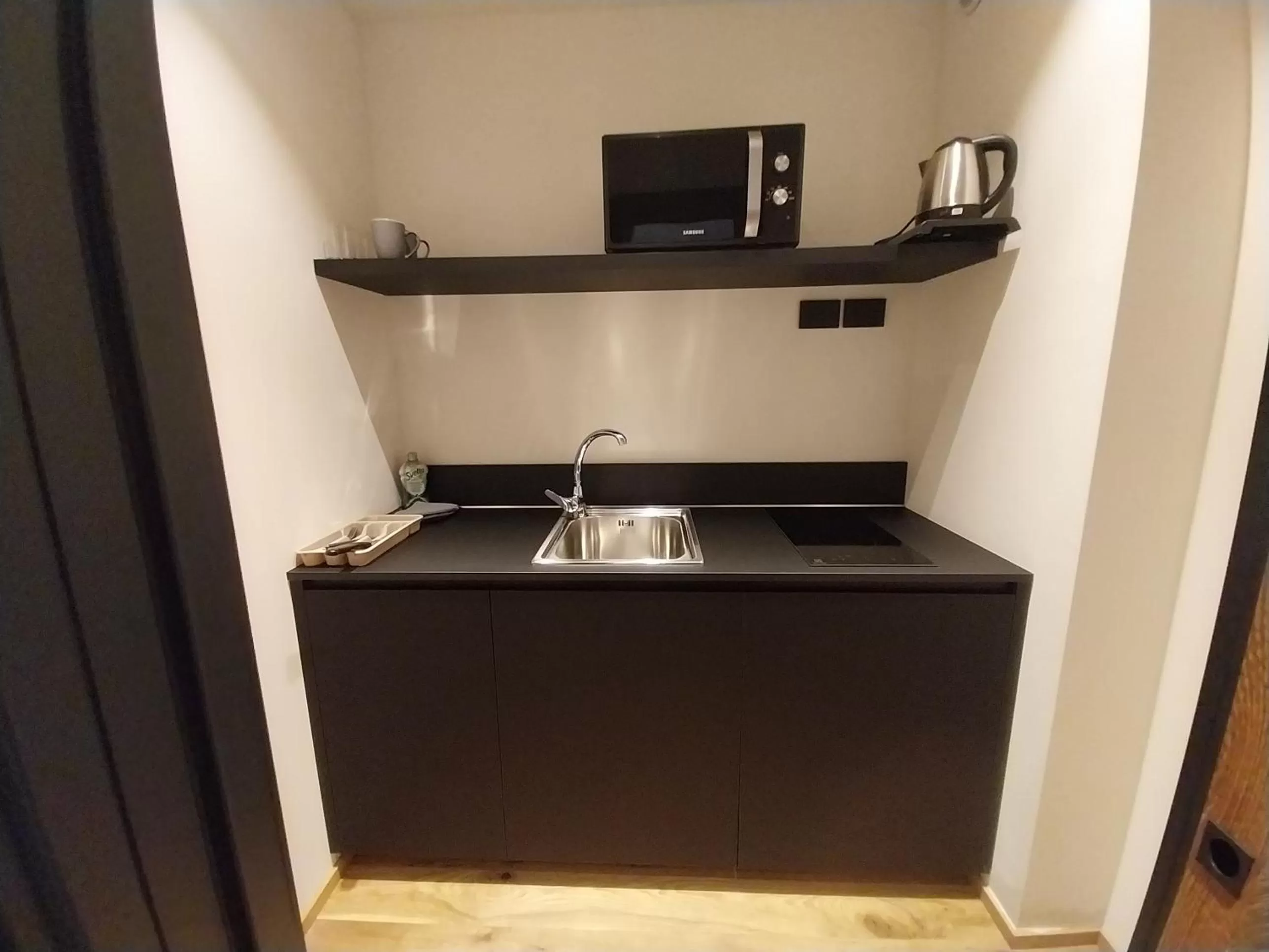 TV/Entertainment Center in Alpuris - Your Boutique Suite - Hotel B&B