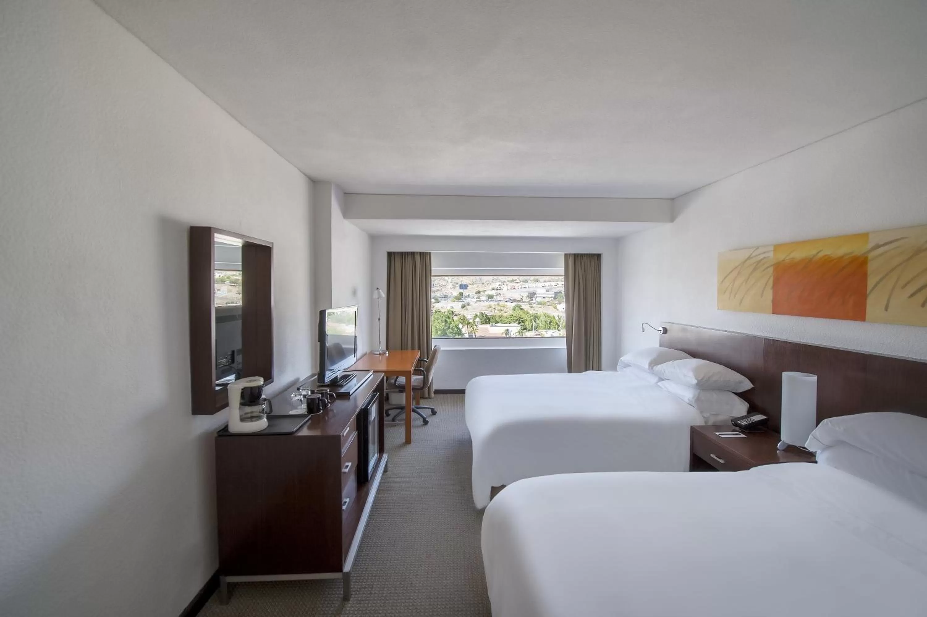 Photo of the whole room, Bed in Fiesta Americana Hermosillo