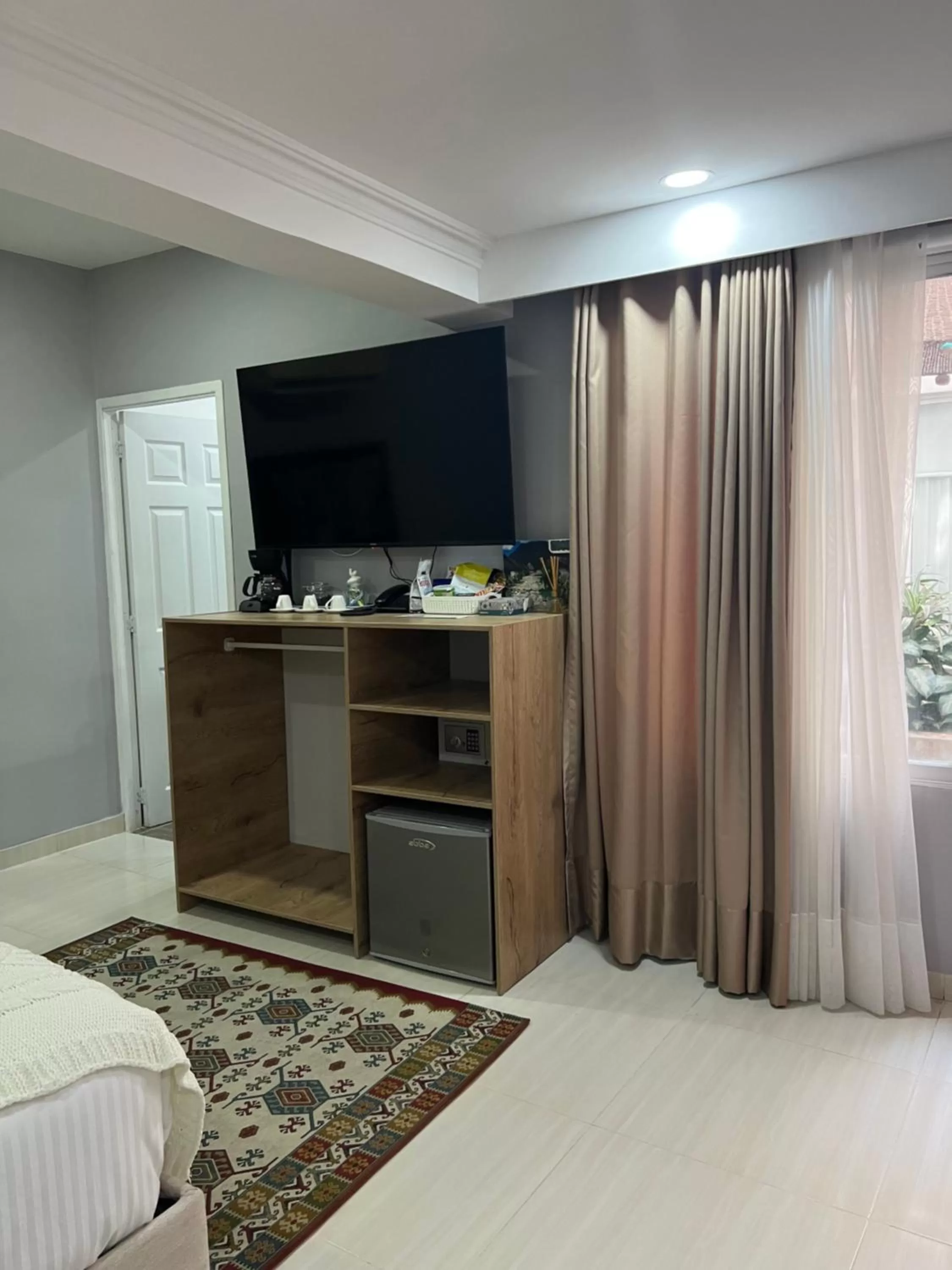 TV and multimedia, TV/Entertainment Center in Hotel Boutique CASA CHUNUU Santa Marta