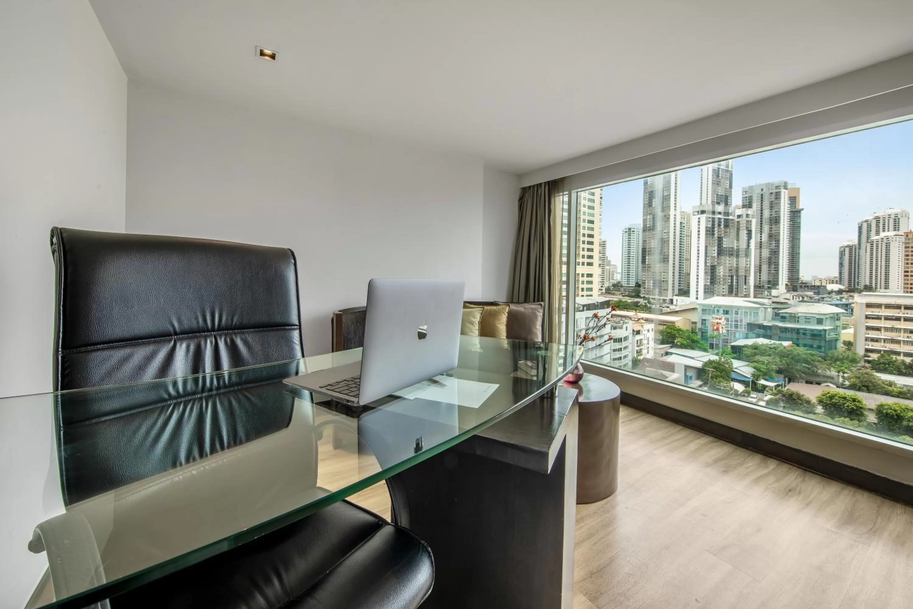 Seating area in Golden Tulip Mandison Suites