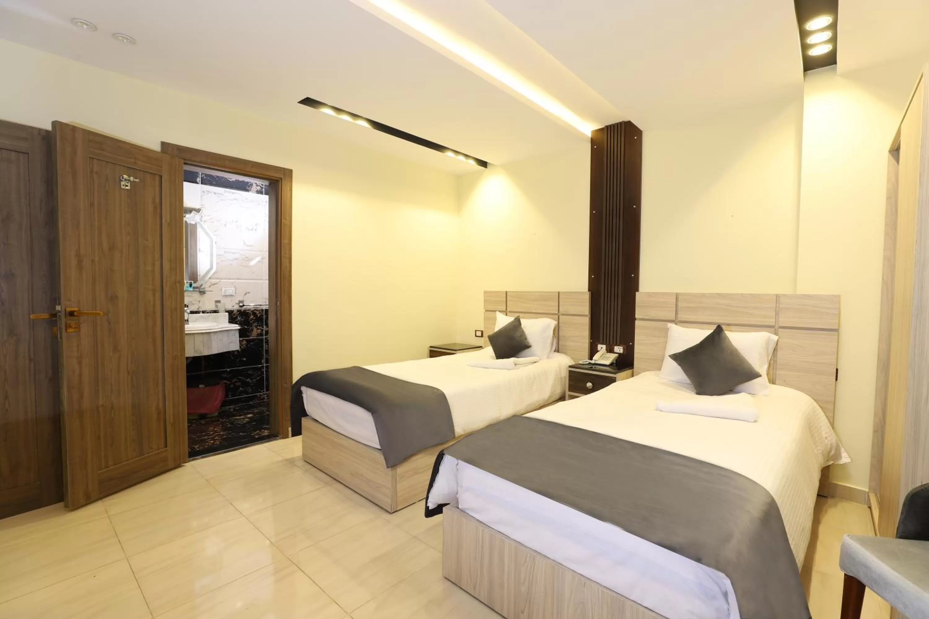 Bed in Brothers Pyramids View Hotel