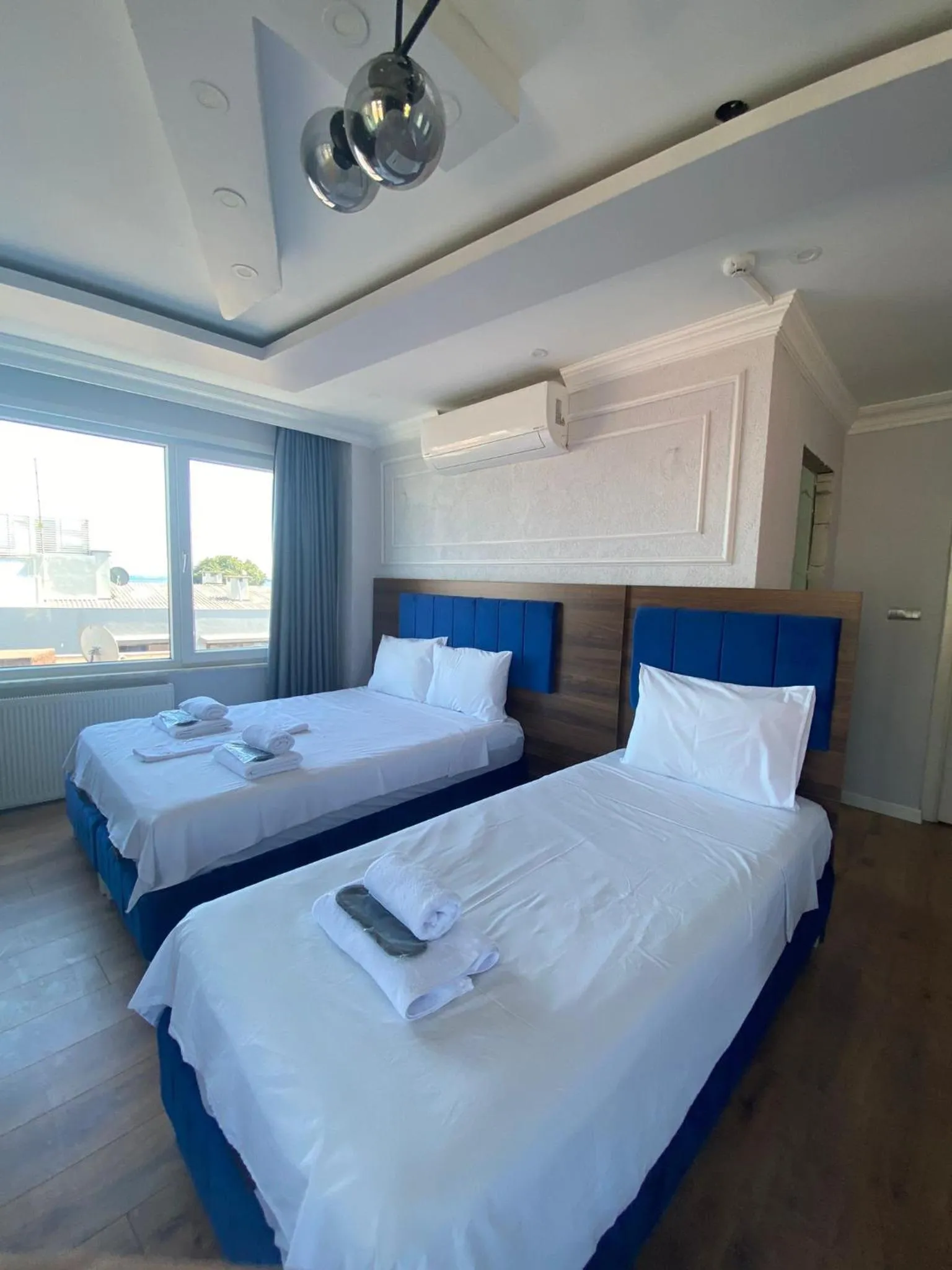 Bed in Aruna Boutique Hotel