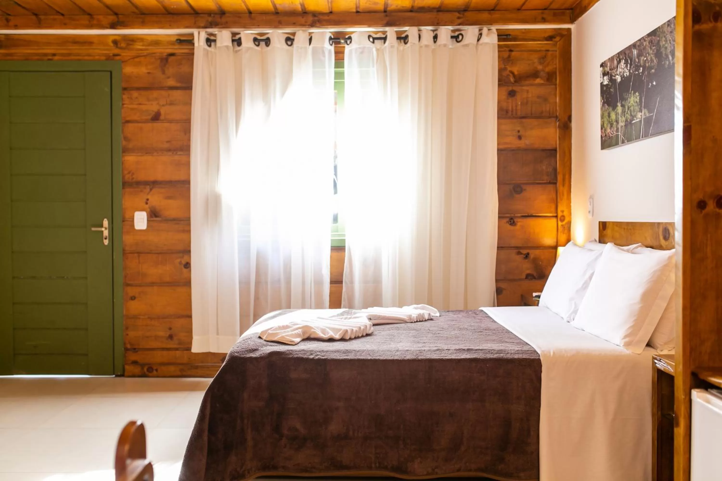 Bed in Pousada Charm Canela