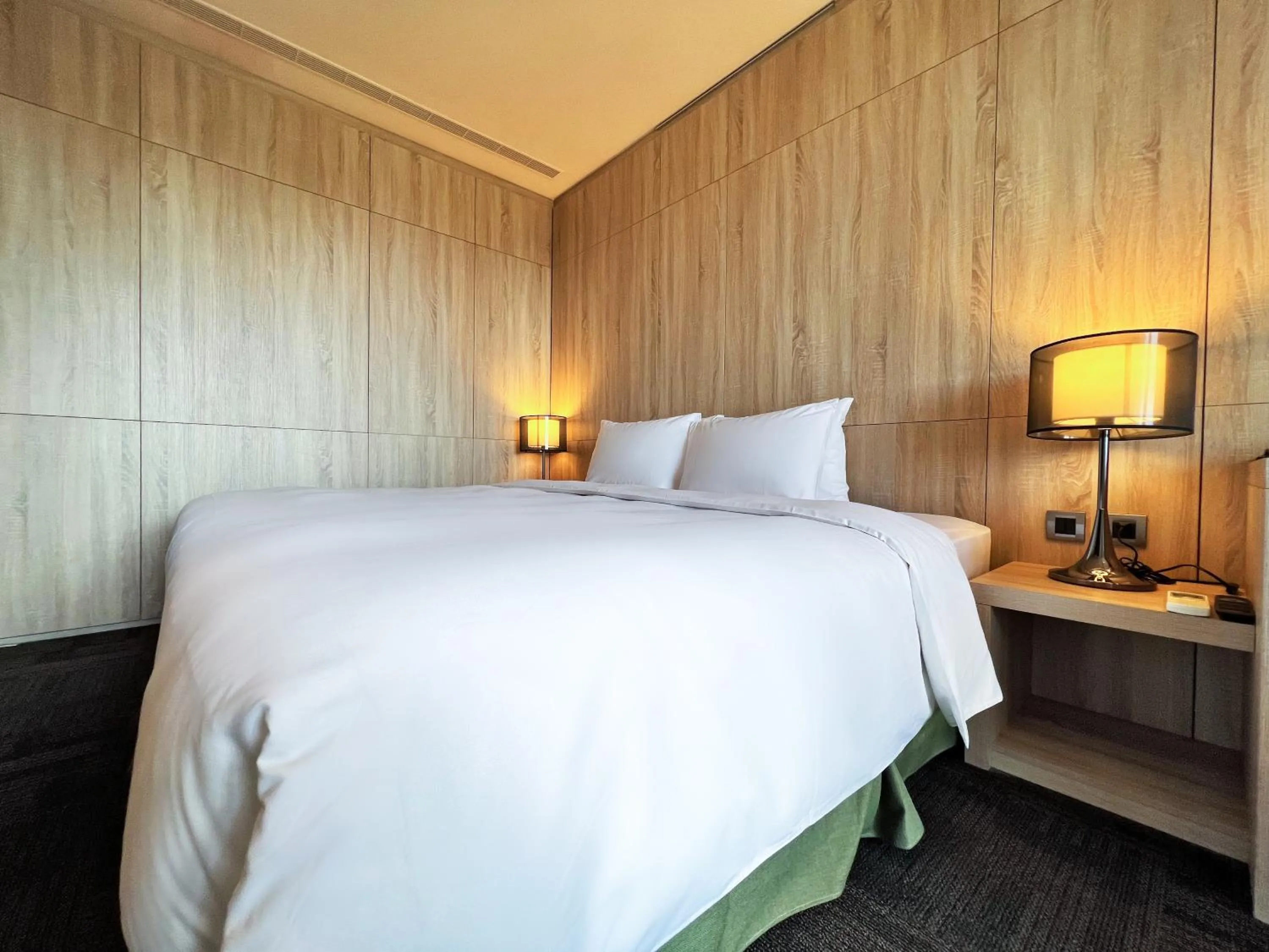 Bed in Wallsun Hotel