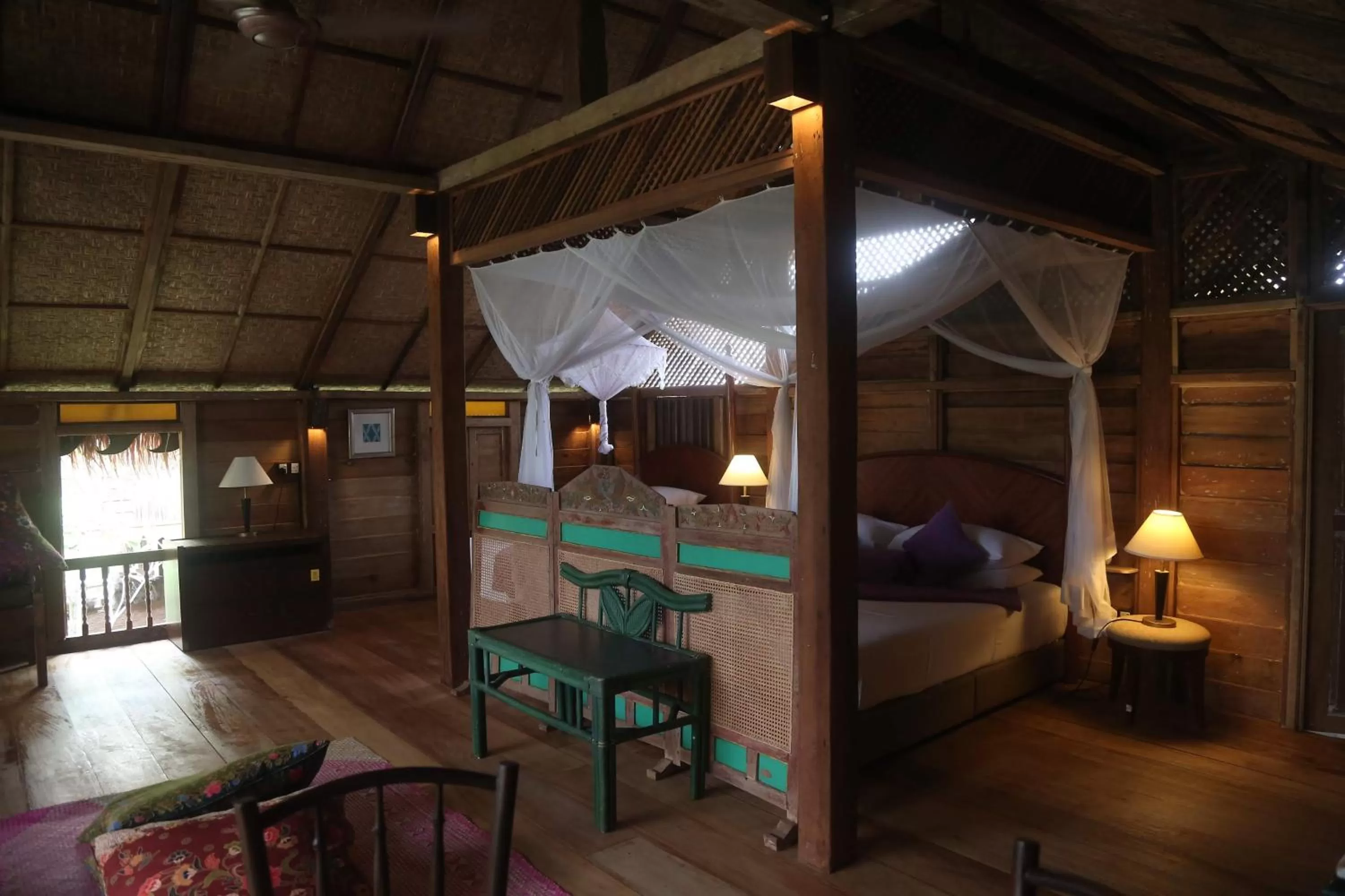 Bed in Kunang Kunang Heritage Villas