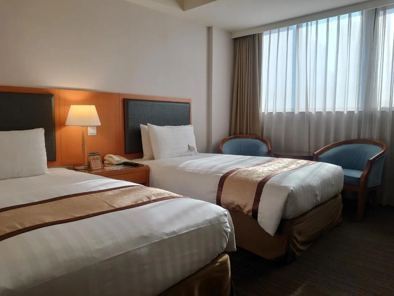 Photo of the whole room, Bed in Fuward Hotel Tainan