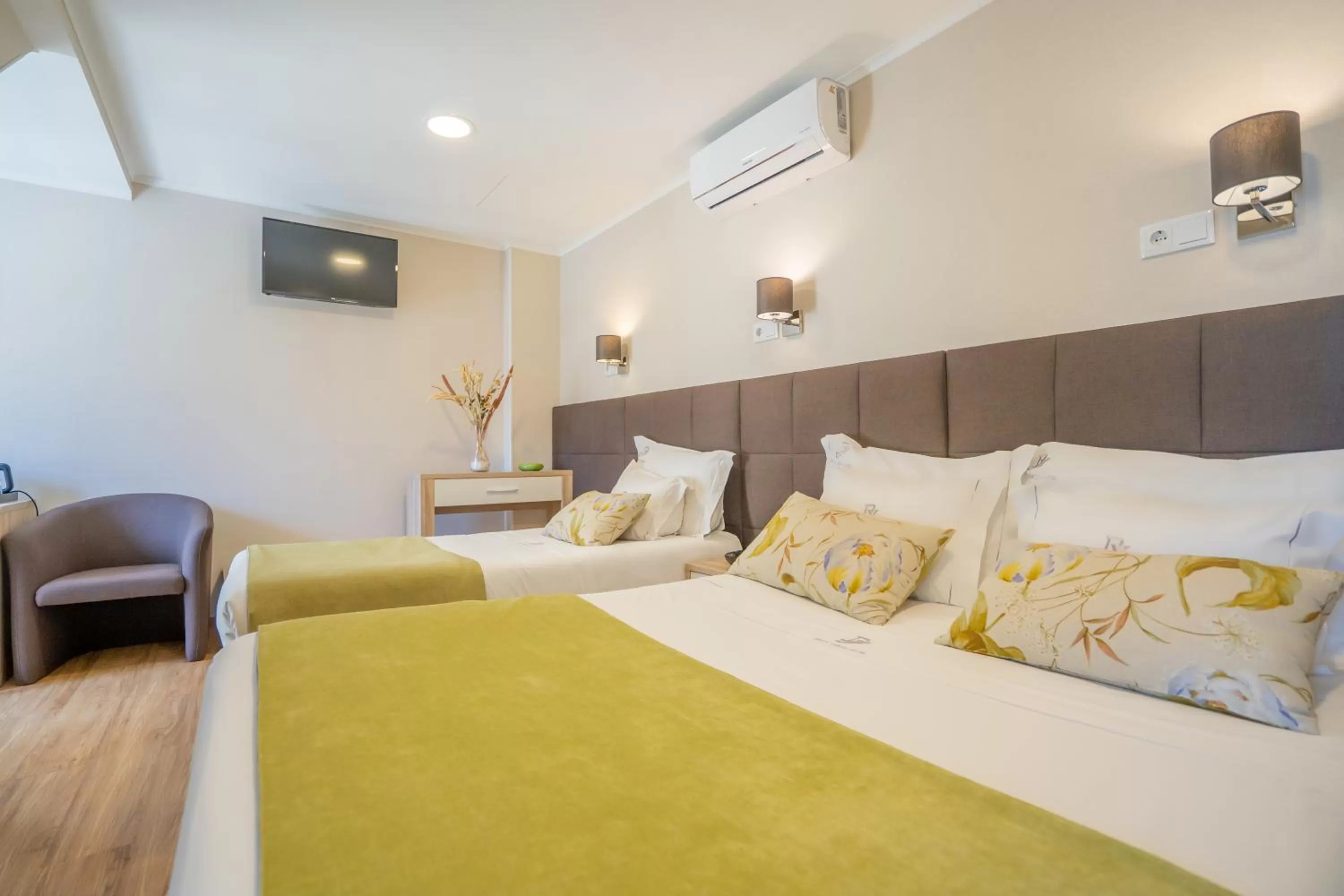 Bed in Dinya Lisbon Hotel