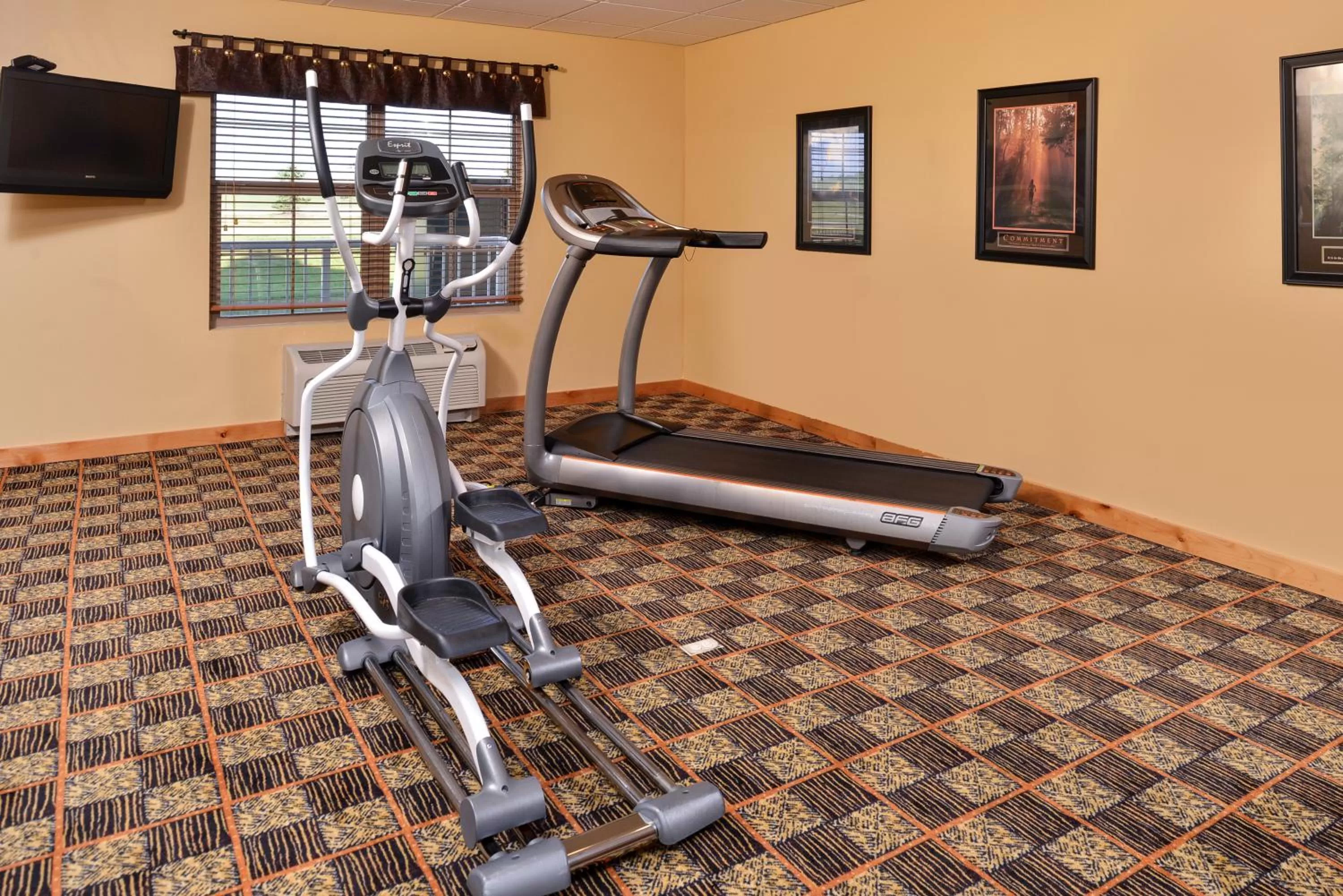 Fitness centre/facilities in AmericInn by Wyndham Fargo Medical Center