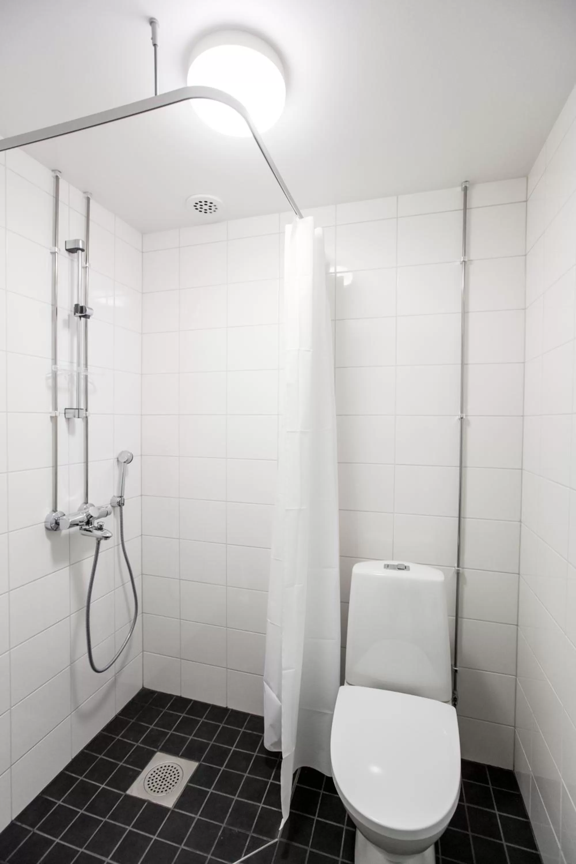 Bathroom in Forenom Aparthotel Helsinki Herttoniemi