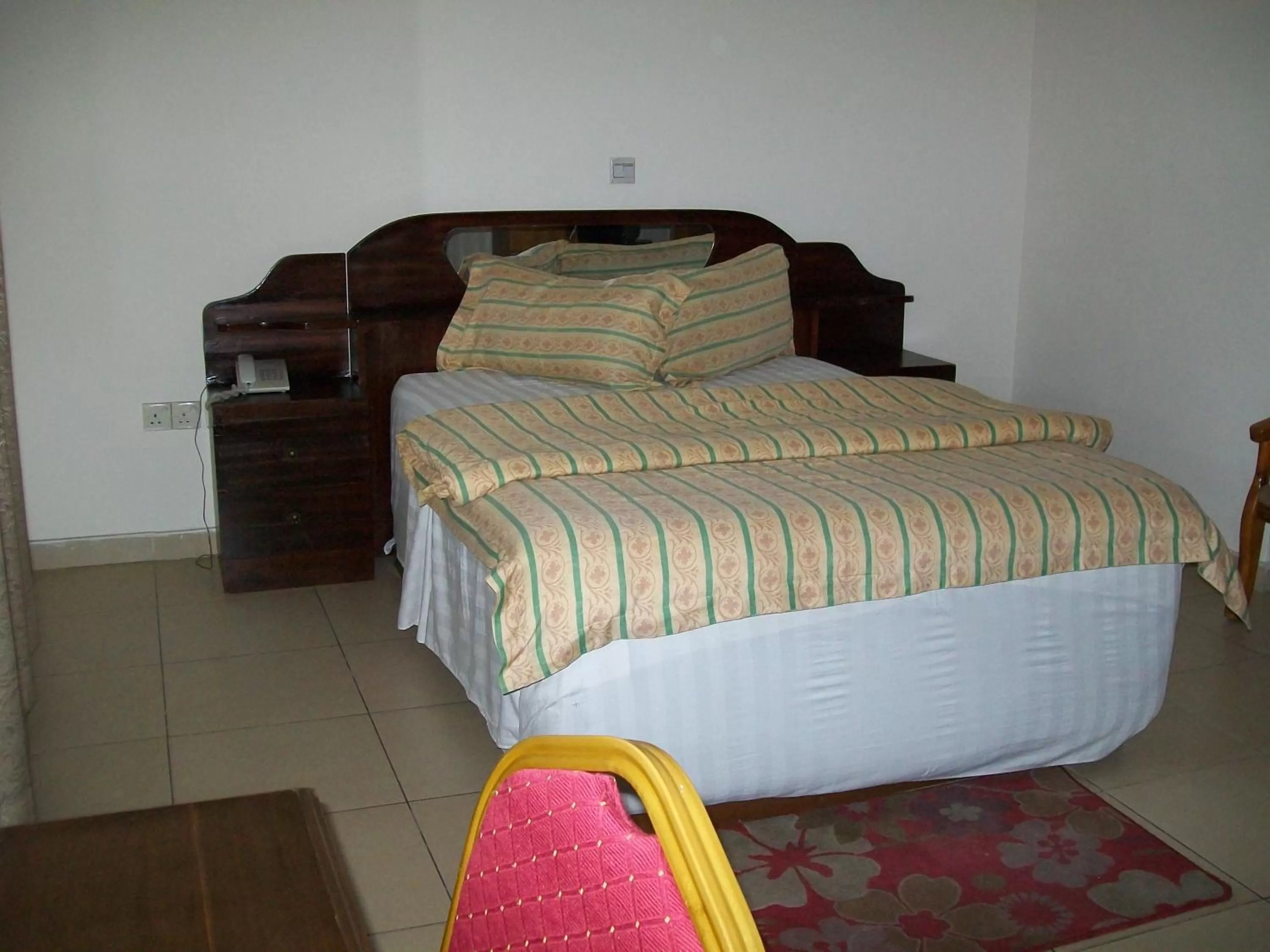 Bed in Ampomaah Hotel