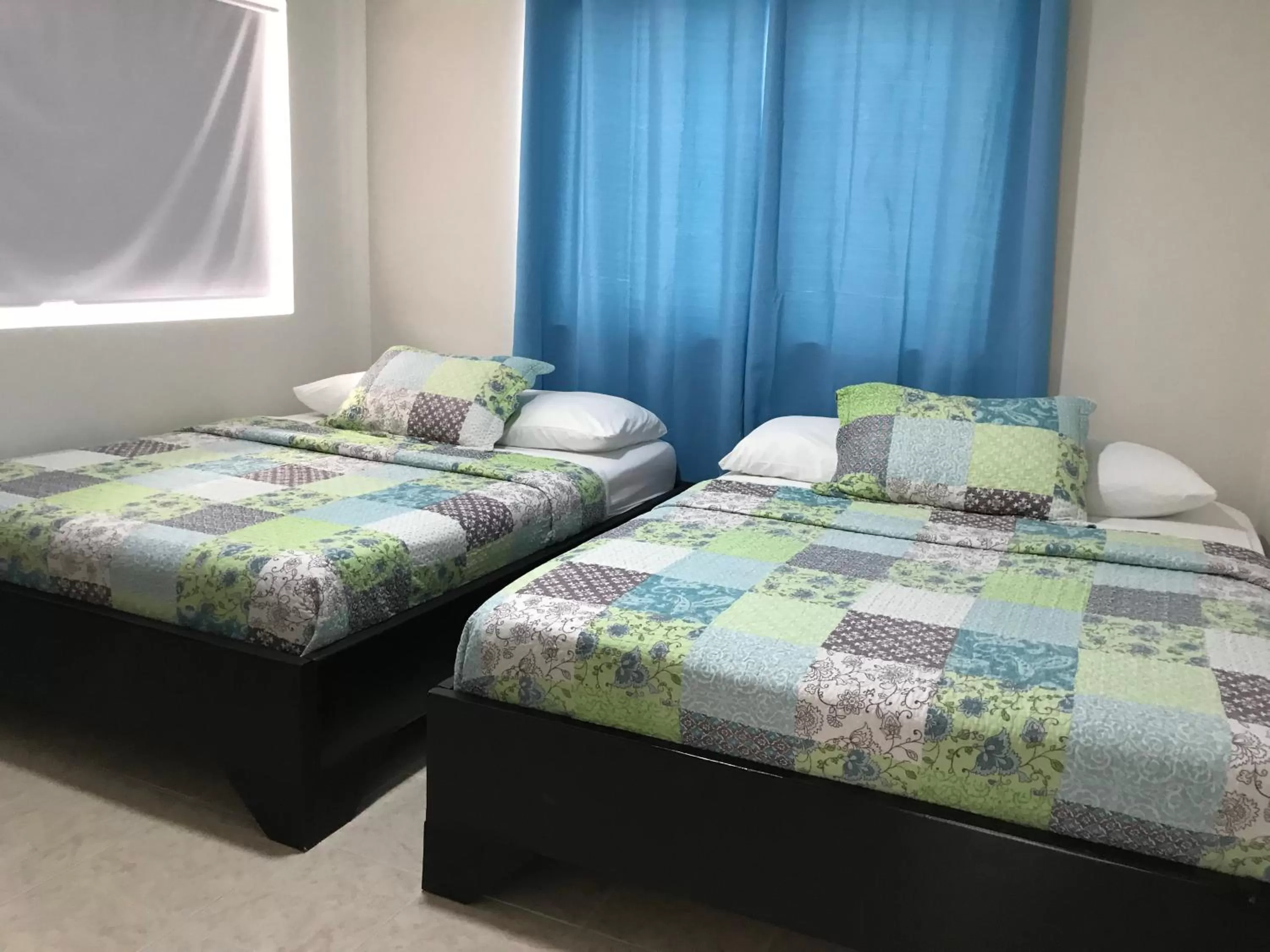 Bed in Caribbean Island Hotel Piso 2