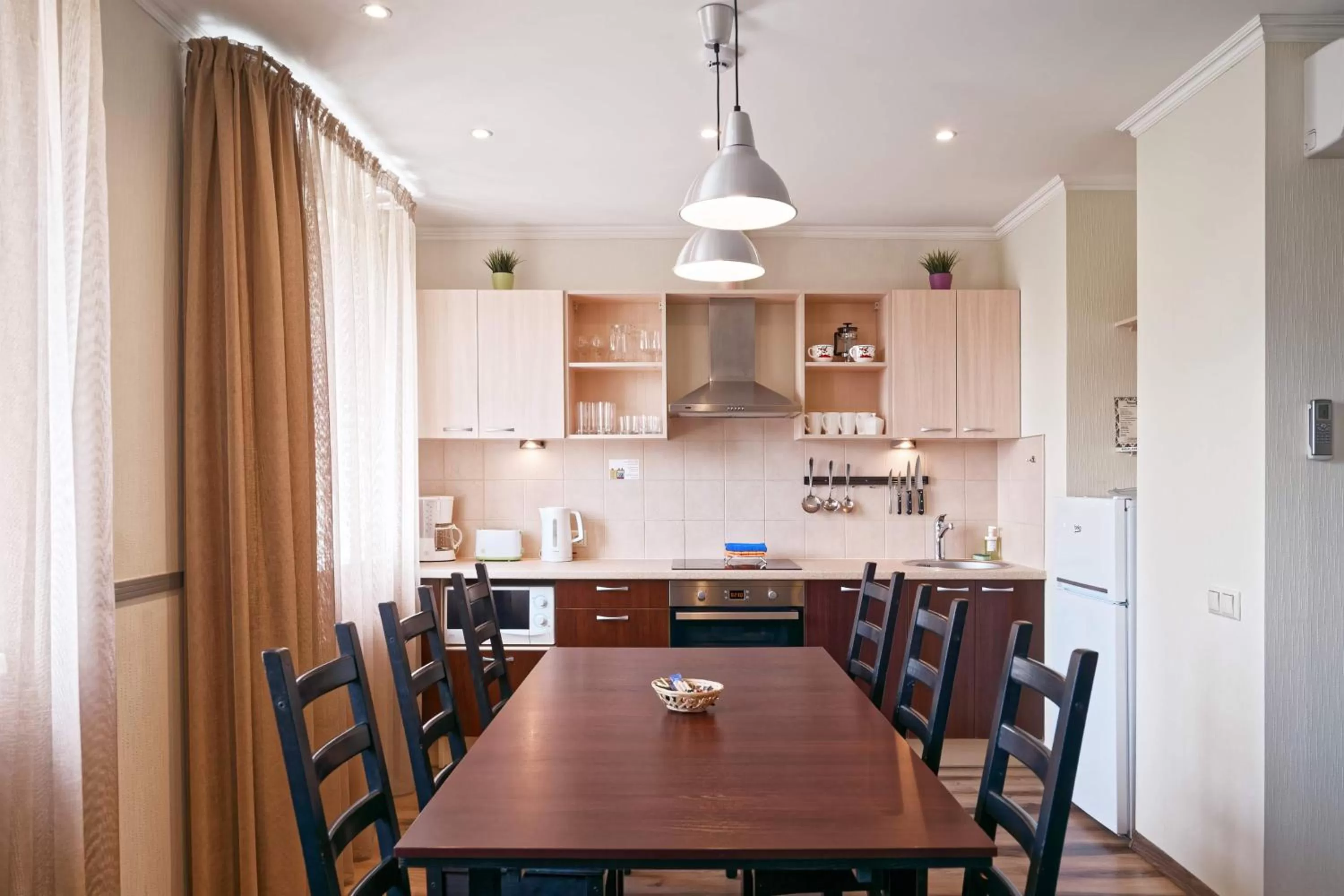 Kitchen or kitchenette in RIGAAPARTMENT SONADA Self-Service Aparthotel - Private Parking