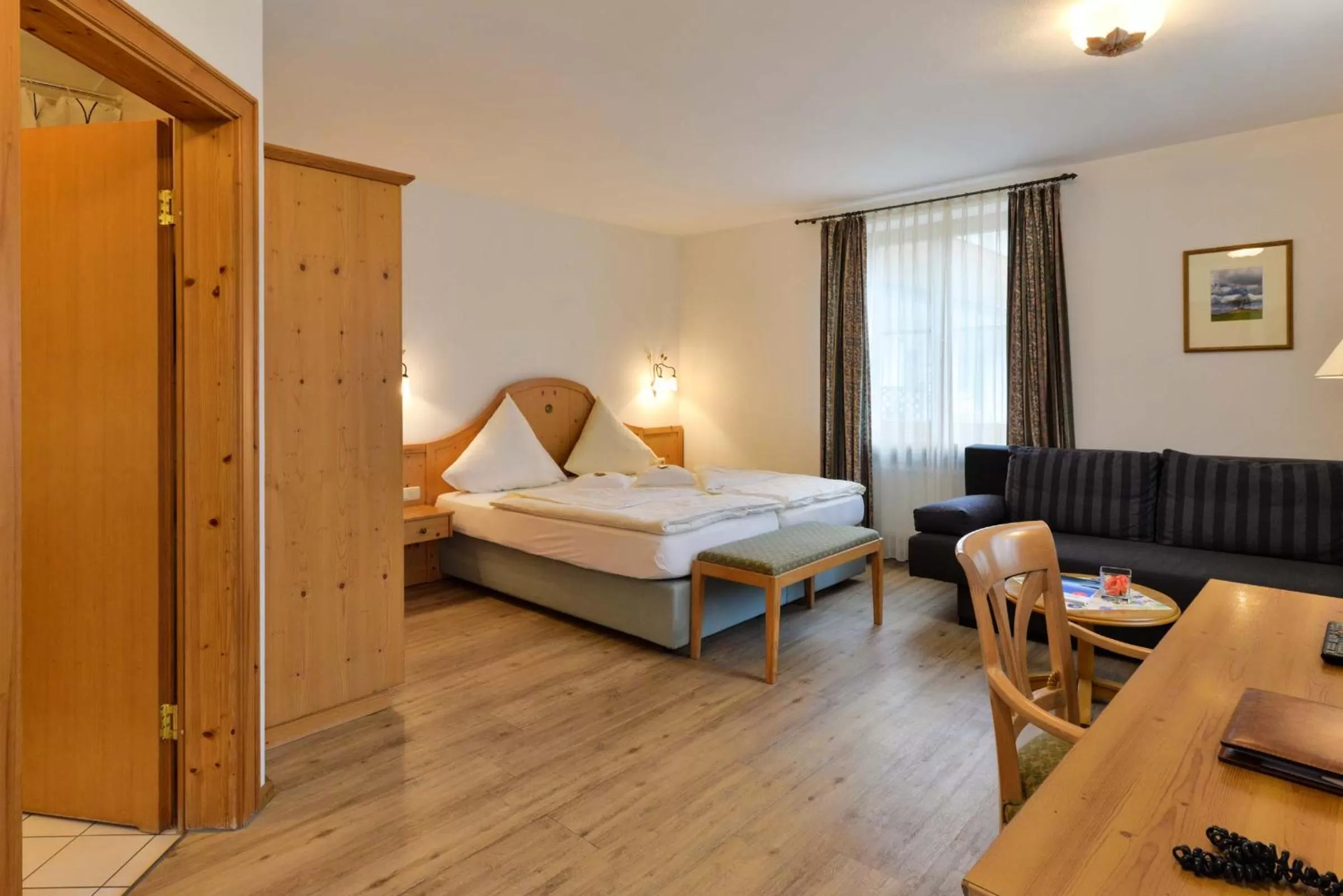 Photo of the whole room, Bed in Landhotel Huber am See