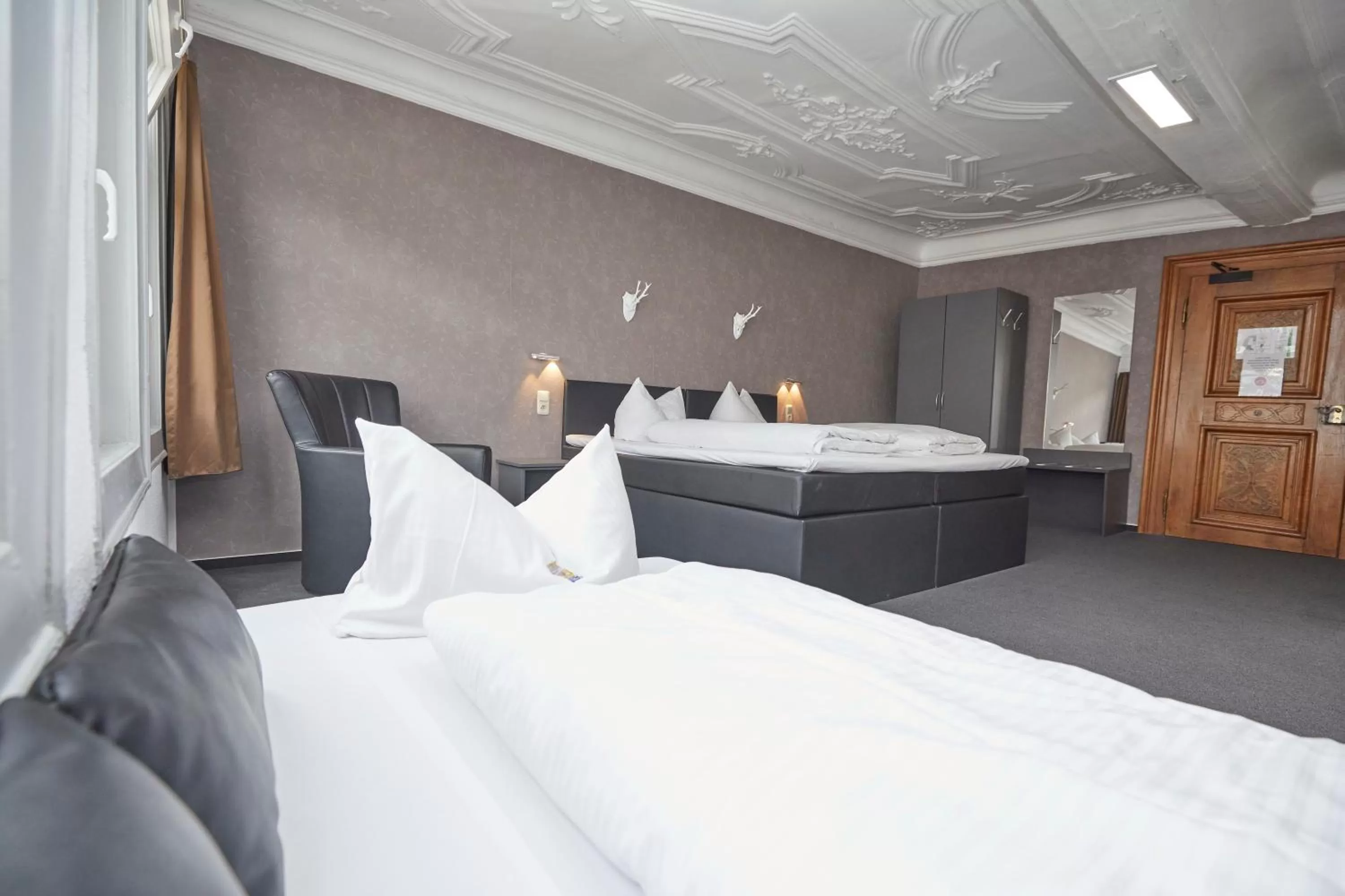 Bed in Hotel Schlemmer Das familäre Altstadt - Hotel mit Herz